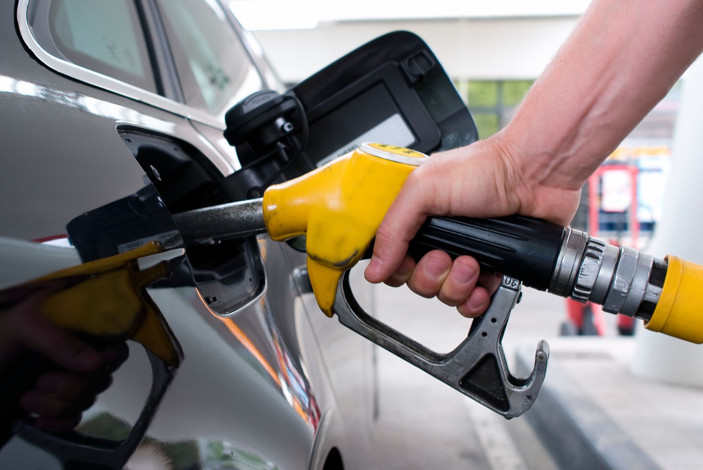 Close-up pumping gasoline on a black car,Image: 152649256, License: Royalty-free, Restrictions: , Model Release: no, Credit line: vwalakte, YAY Media AS / Alamy / Profimedia