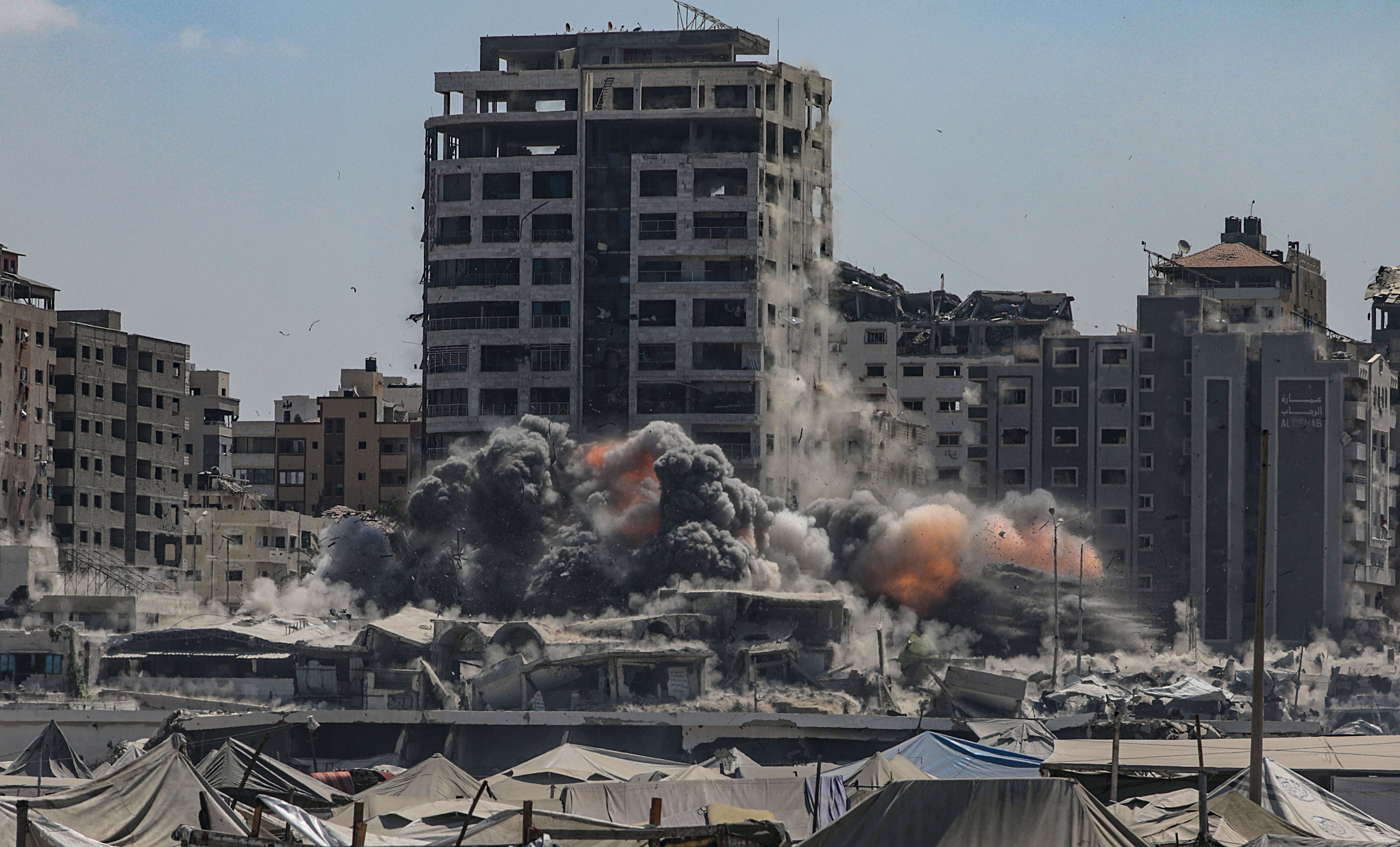 Smoke rises at Harmony Tower following an Israeli airstrike in the west of Gaza City