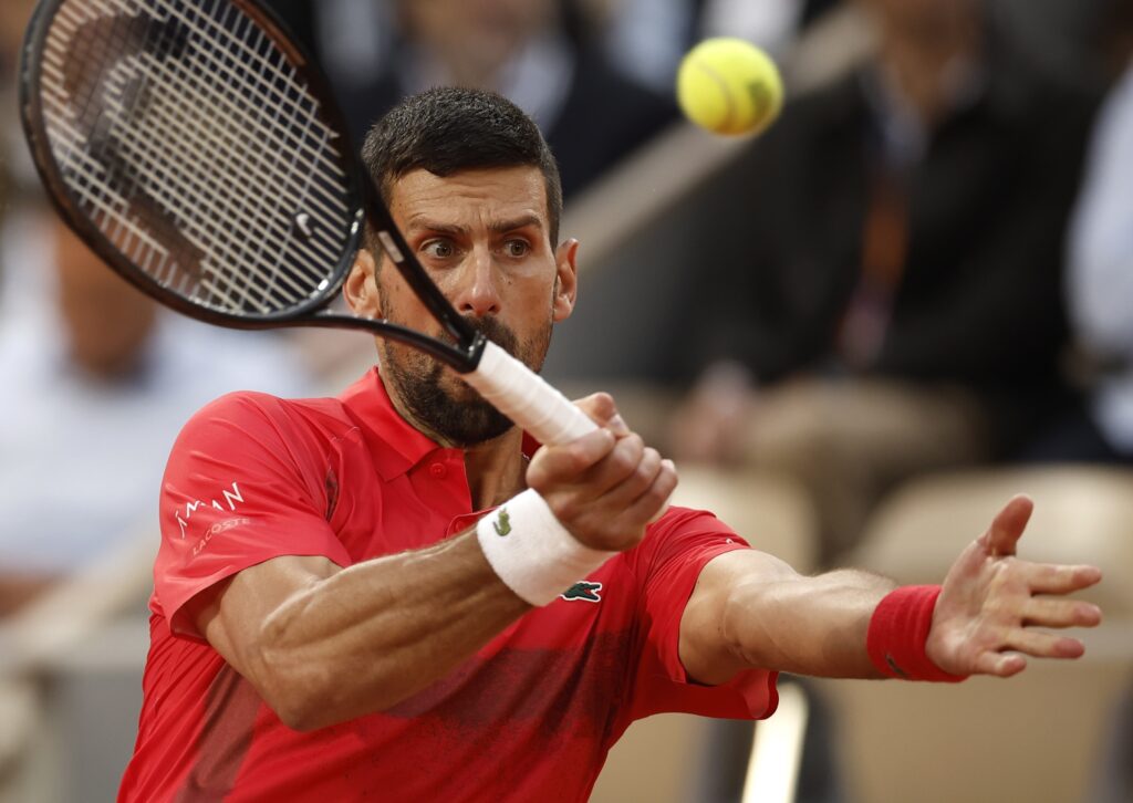 epa12155823 Novak Djokovic of Serbia in action during his Men's singles quarter-finals match against Alexander Zverev of Germany at the French Open Grand Slam tennis tournament at Roland Garros in Paris, France, 04 June 2025.  EPA-EFE/YOAN VALAT