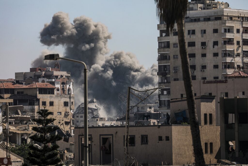 epa12373203 Smoke rises from the Abu Ghanima building following an Israeli airstrike in Gaza City, Gaza Strip, 13 September 2025.  EPA/MOHAMMED SABER