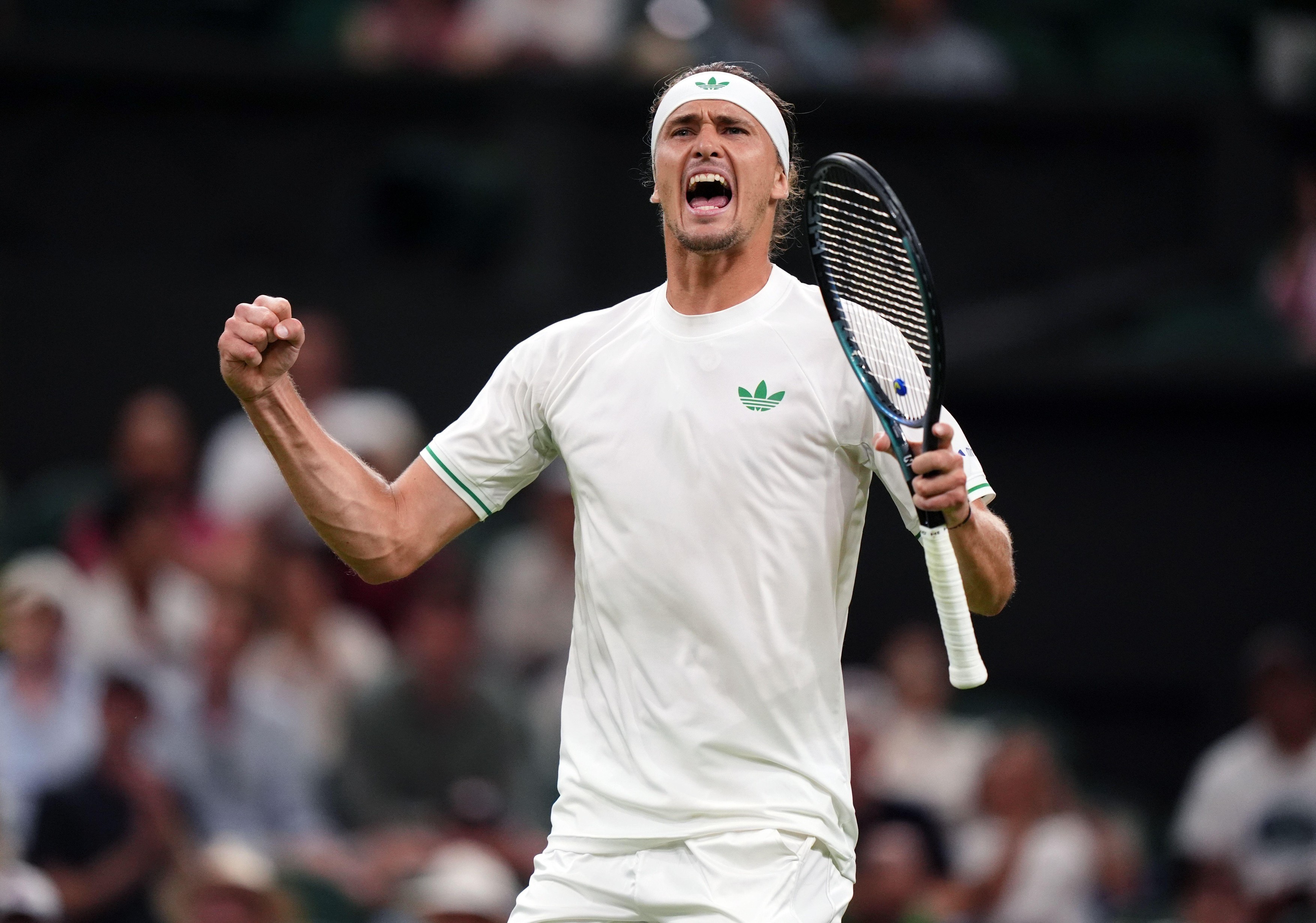 Alexander Zverev celebrates winning the second set during his match against Arthur Rinderknech on day one of the 2025 Wimbledon Championships at the All England Lawn Tennis and Croquet Club, London. Picture date: Monday June 30, 2025.