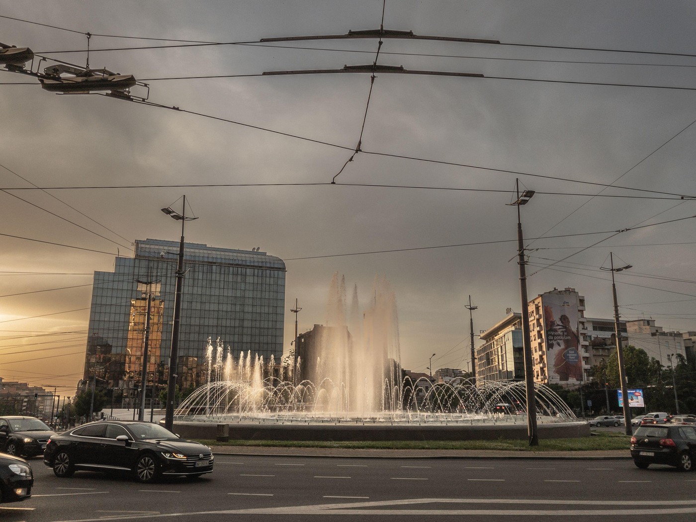 Picture of cars packing at rush hour on Trg Slavija square during dusk. Slavija Square is a major commercial junction, situated between the intersecti