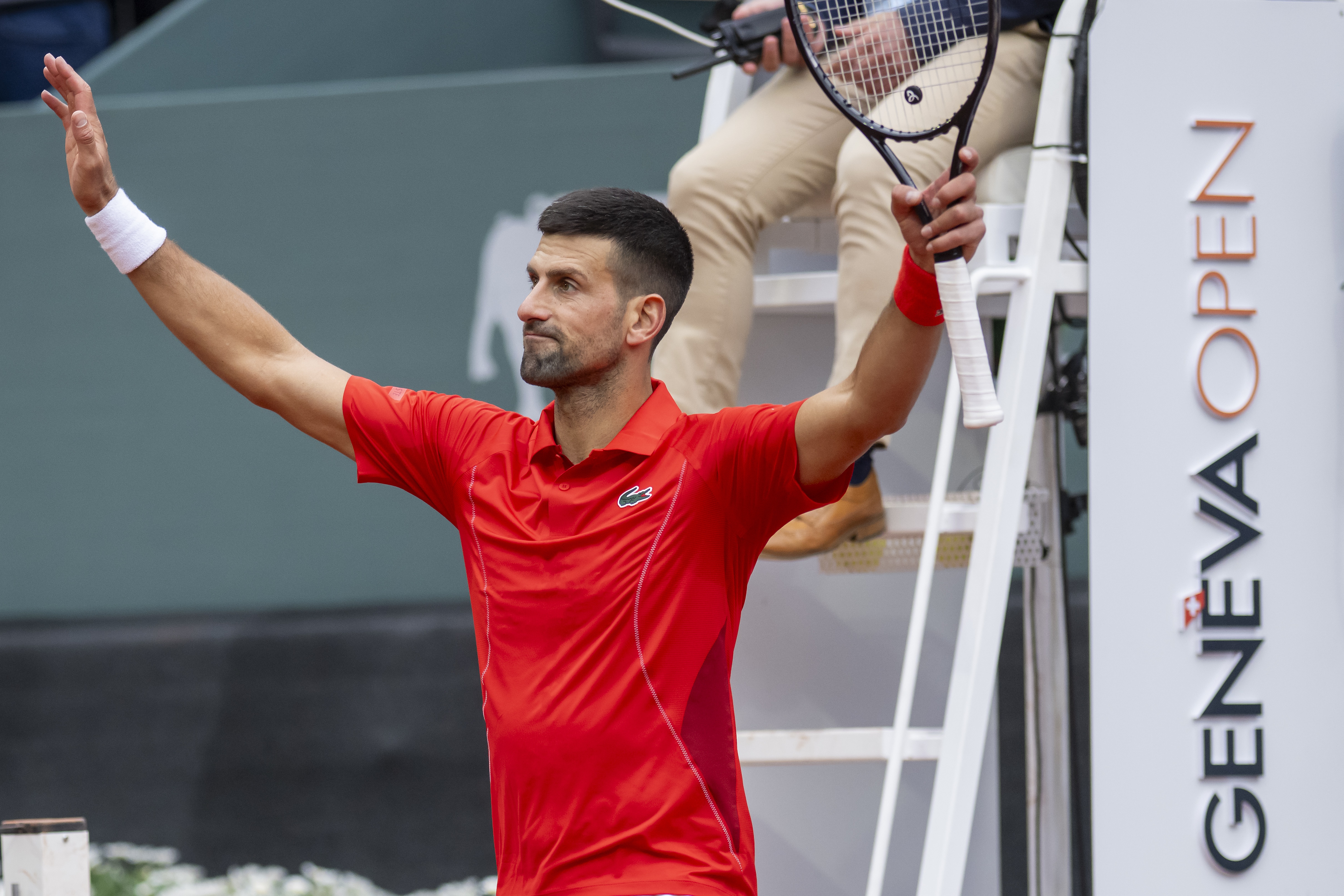 epa11364074 Novak Djokovic of Serbia celebrates winning his singles quarter-final match against Tallon Griekspoor of Netherlands, at the ATP 250 Geneva Open tennis tournament, in Geneva, Switzerland, 23 May 2024.  EPA-EFE/MARTIAL TREZZINI