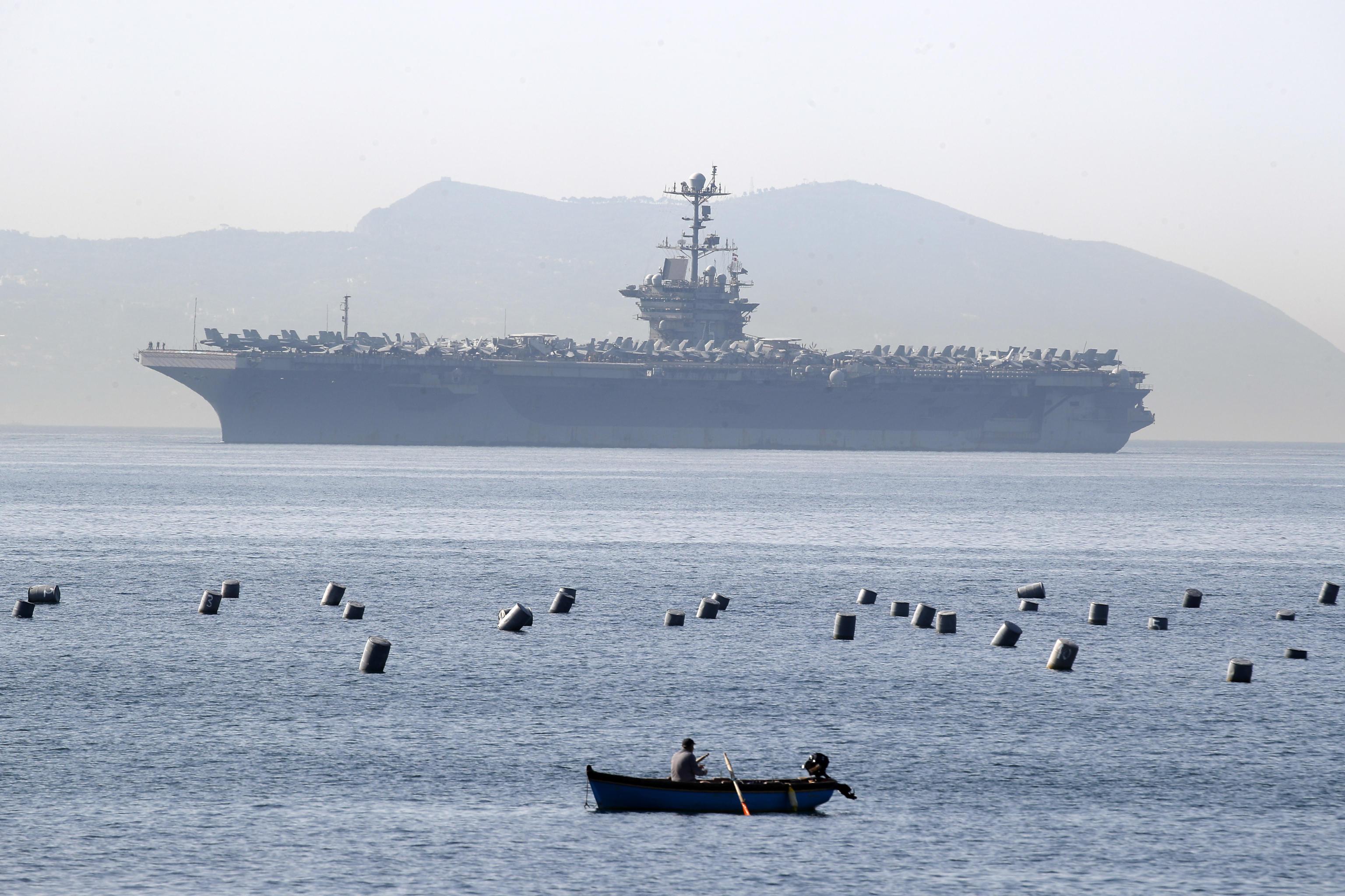 epa09937561 The American aircraft carrier USS harry S. Truman upon its arrival in the gulf of Naples for a scheduled stop in the port in Naples, Italy, 10 May 2022. The last visit of the ship goes back to six years ago.  EPA-EFE/ANSA / CIRO FUSCO