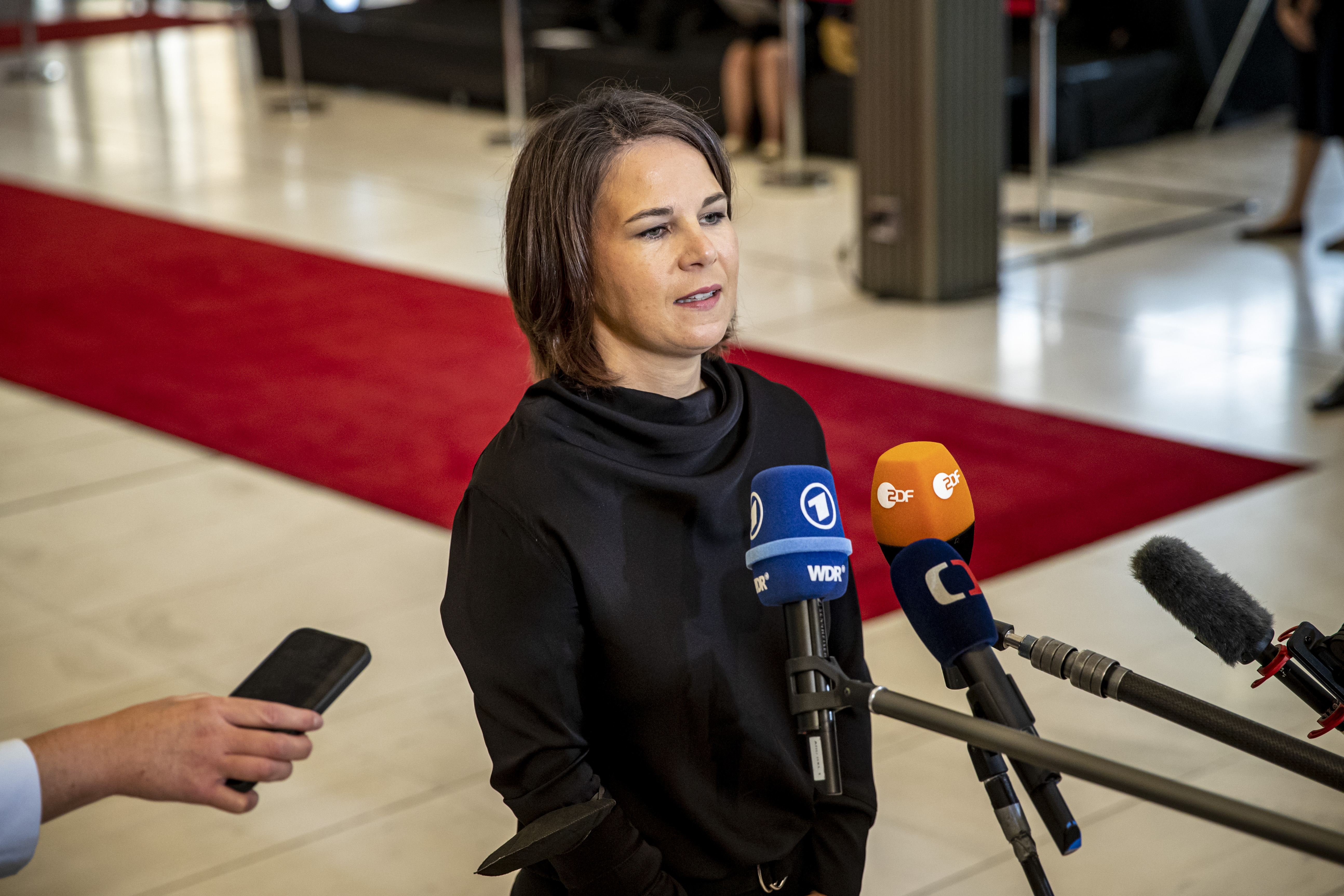 epa10149046 German Foreign Minister Annalena Baerbock talks to media as she arrives for the European Foreign Ministerial Meeting in Prague, Czech Republic, 31 August 2022.  EPA-EFE/MARTIN DIVISEK
