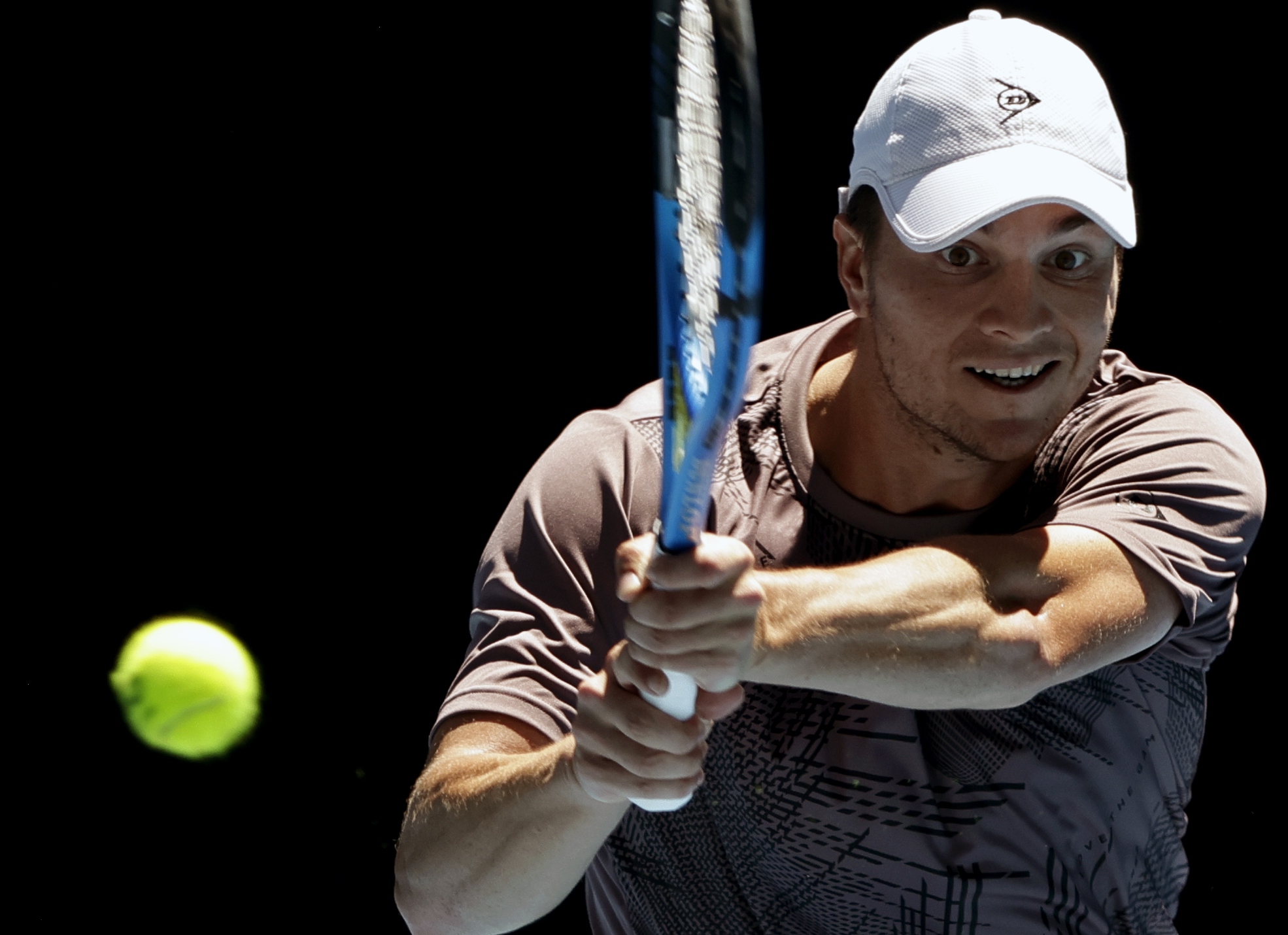 epa11827608 Miomir Kecmanovic of Serbia in action during his Men's Singles round 2 match against Hubert Hurkacz of Poland at the Australian Open tennis tournament in Melbourne, Australia, 16 January 2025.  EPA-EFE/ROLEX DELA PENA