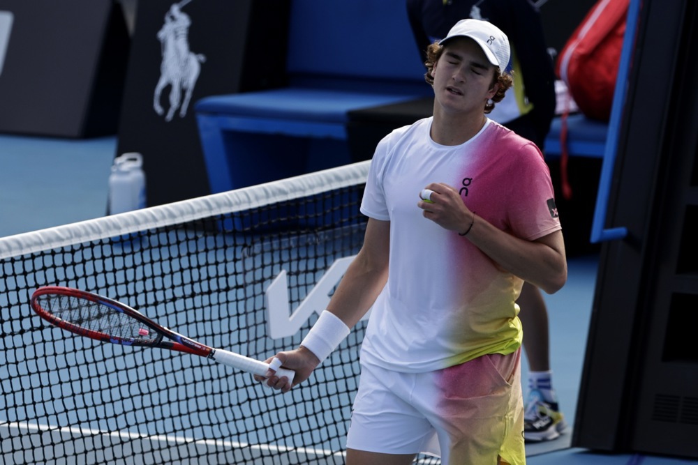 epa11827972 Joao Fonseca of Brazil reacts during his Men's round 2 match against Lorenzo Sonego of Italy at the Australian Open tennis tournament in Melbourne, Australia, 16 January 2025.  EPA-EFE/ROLEX DELA PENA