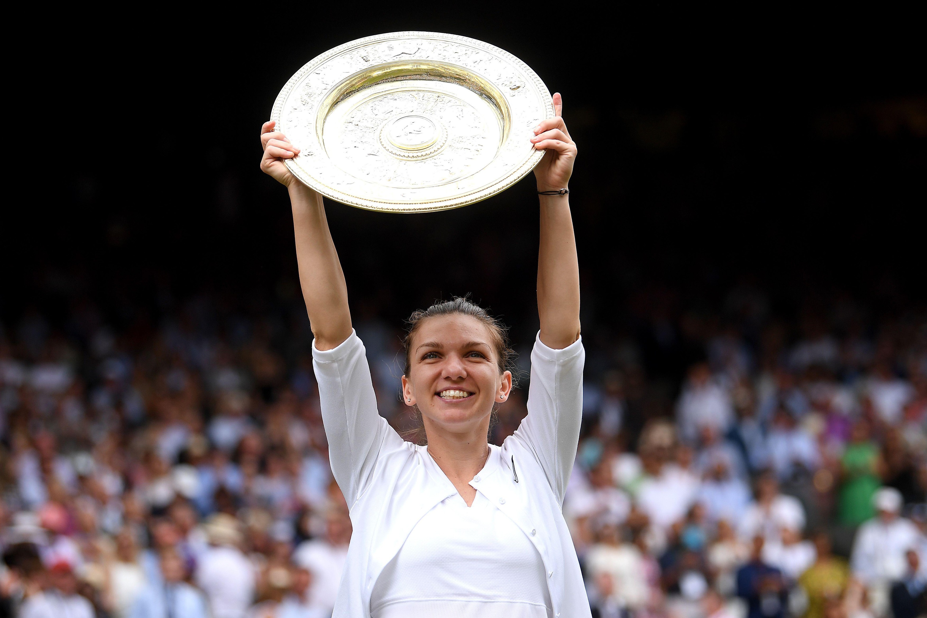 File photo dated 13-07-2019 of Simona Halep with the trophy after winning the women's singles final at Wimbledon 2019. Issue date: Monday June 21.