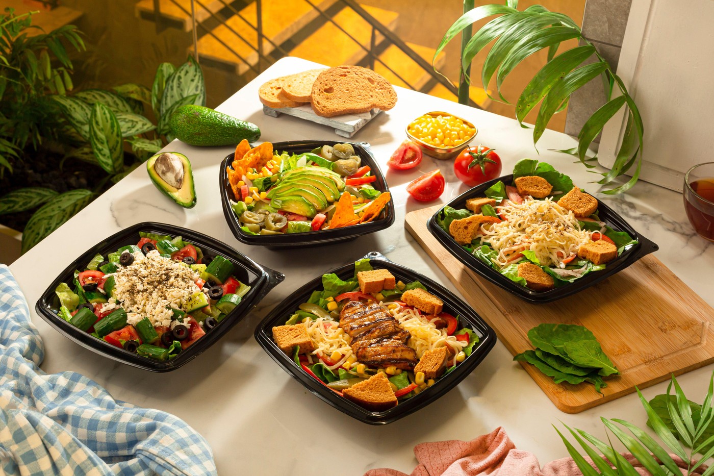Assorted luxury western salads avocado salad with vegetables cheese salad with toasted bread and vegetables vegetable salad with grilled chicken breas