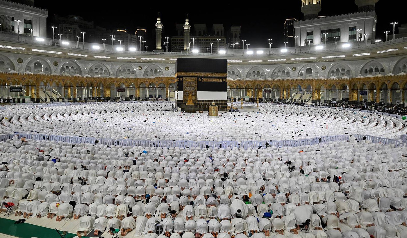 Muslim worshippers gather around the Kaaba, Islam's holiest shrine, at the Grand Mosque complex in the holy city of Mecca