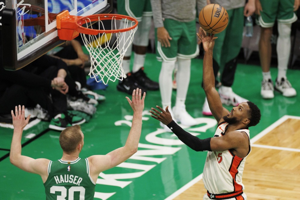 epa11757922 Detroit Pistons guard Malik Beasley jumps for a basket past Boston Celtics forward Sam Hauser during the second half of an NBA game in Boston, Massachusetts, USA, 04 December 2024.  EPA/CJ GUNTHER SHUTTERSTOCK OUT