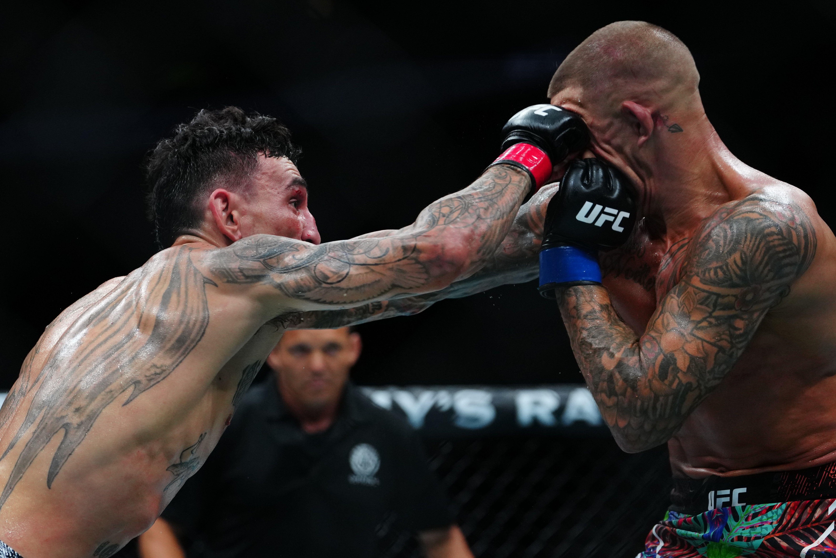 NEW ORLEANS, LA - JULY 19 : Max Holloway and Dustin Poirier meet in the octagon for a 5-round BMF title main event bout for UFC318 - Holloway vs Poirier 3 at Smoothie King Center on July 19, 2025 in New Orleans, LA (Photo by Louis Grasse/PxImages)