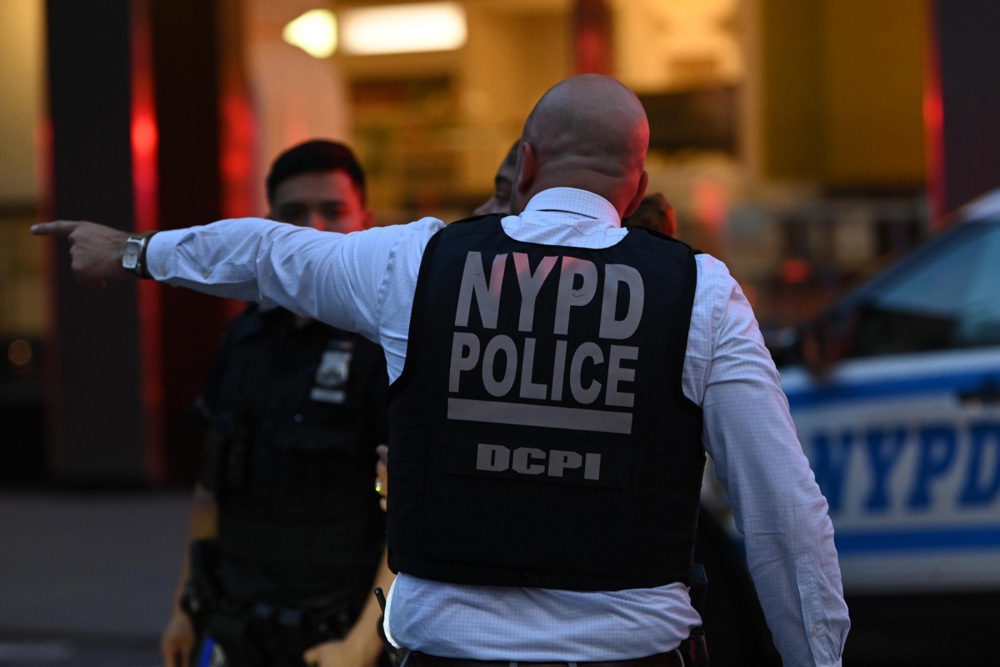 New York Police Officers respond to an active shooter incident in midtown