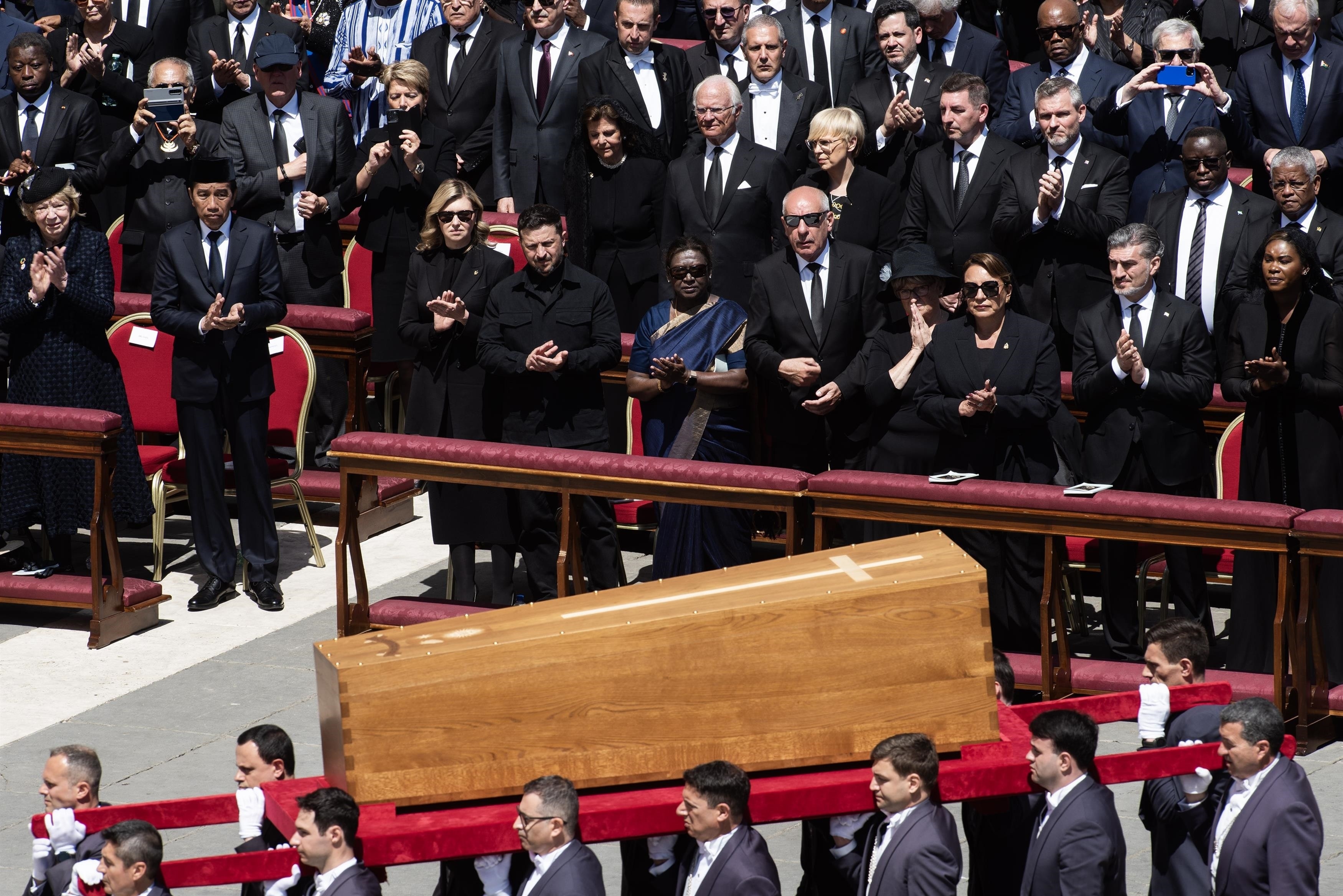 Banner reading "Farewell Father, teacher and poet" seen at Pope Francis' funeral in St. Peter's Square