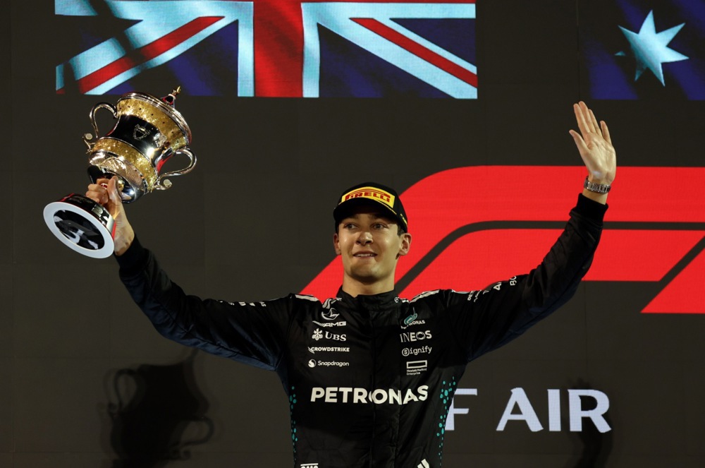 epa12030250 Second winner Mercedes driver George Russell of Britain celebrates with his trophy after the Formula One Bahrain Grand Prix in Sakhir, Bahrain, 13 April 2025.  EPA-EFE/ALI HAIDER