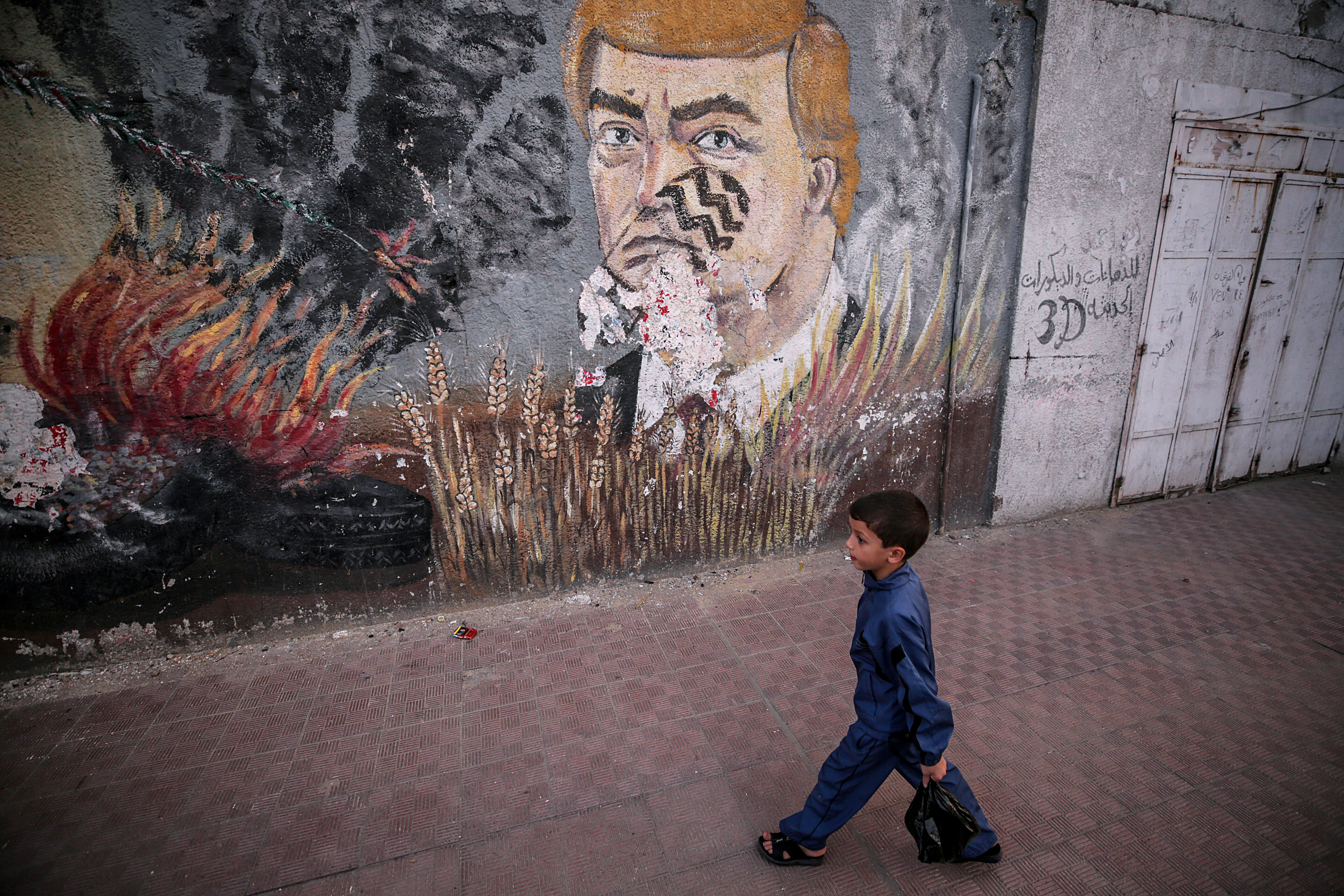 Mural againsr US President Donald Trump in Gaza