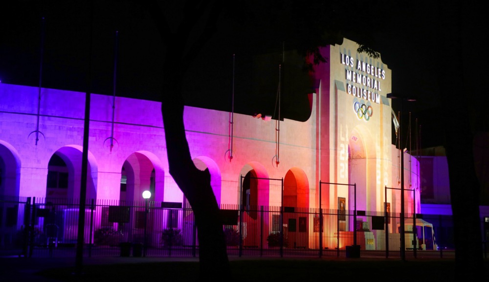 Los Angeles city landmarks lite up with Olympic colors after official announement