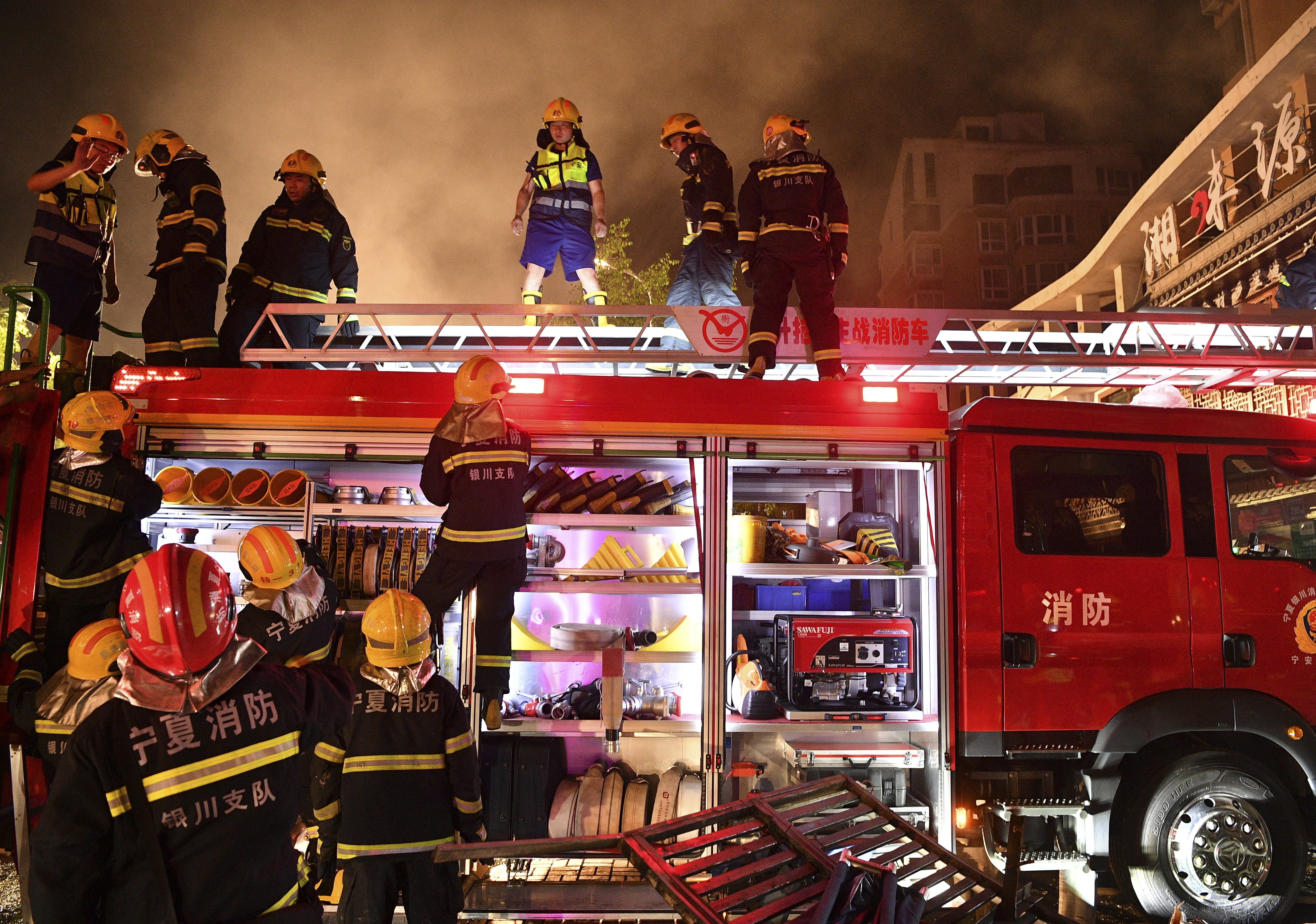 Firefighterswork at the site of an explosion in Yinchuan