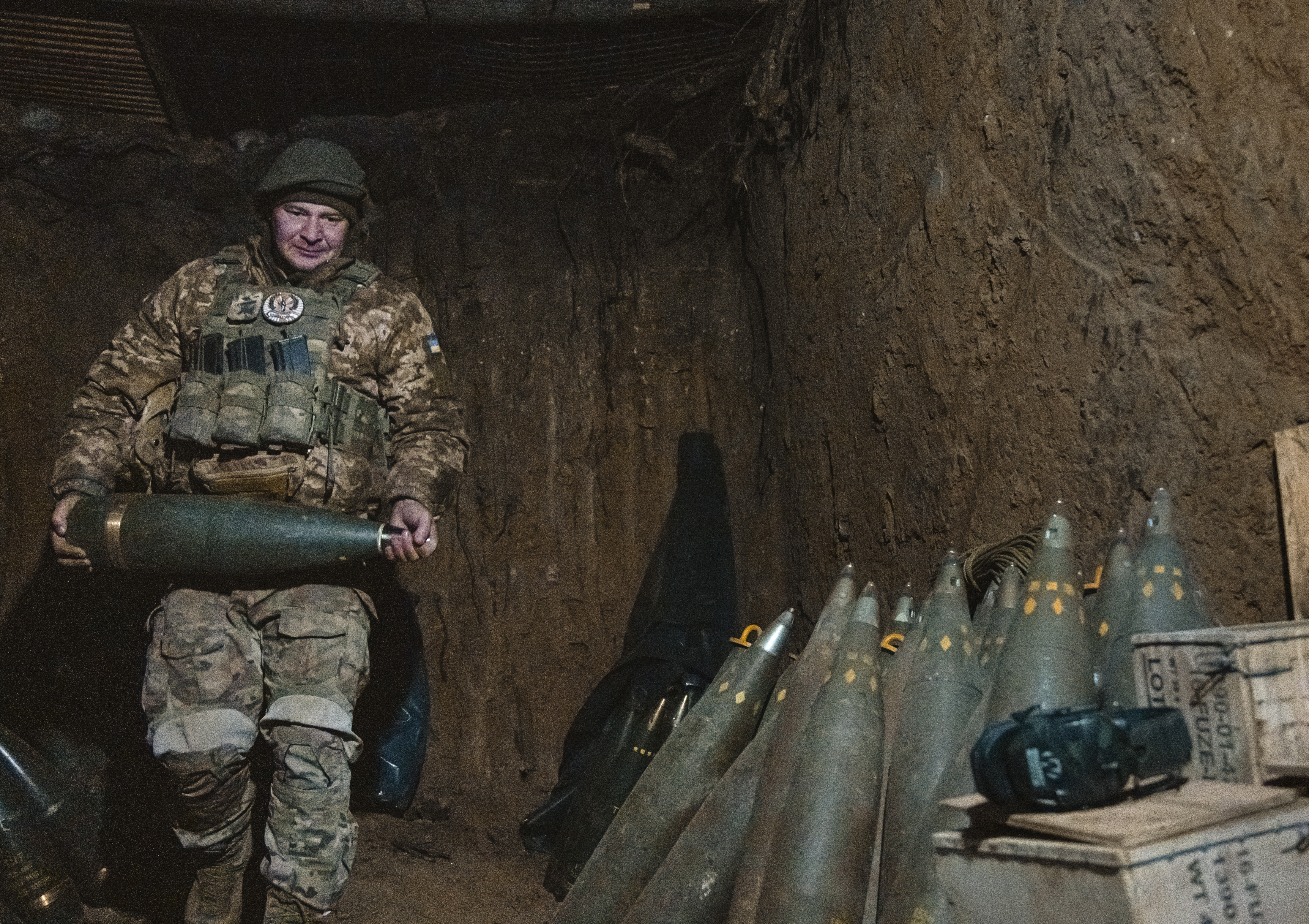 Ukrainian servicemen operate with an American155 mm turreted self-propelled howitzer M109 on a frontline in the Zaporizhzhia area