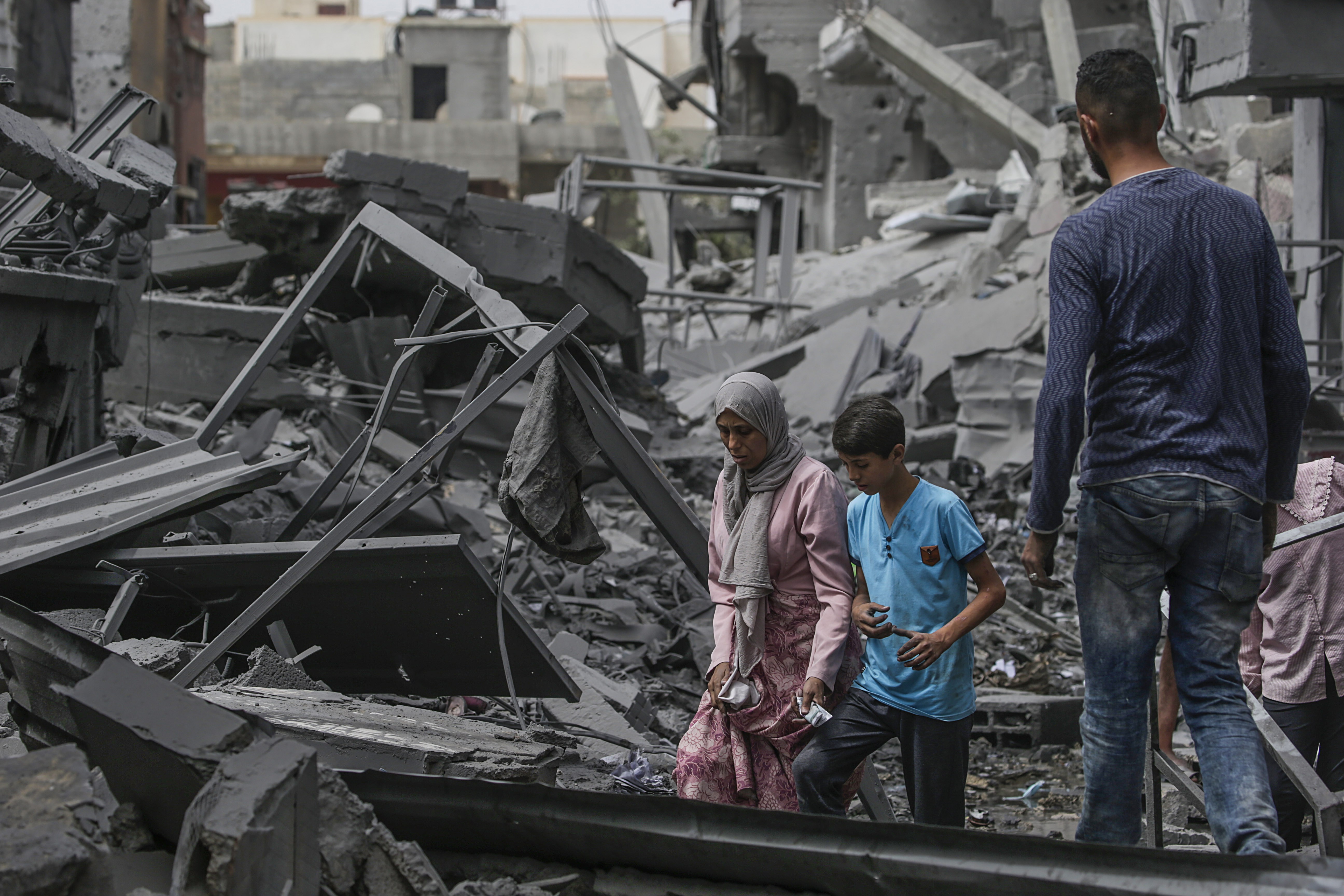 Palestinians assess damages after Israeli strikes on Al Maghazi camp, southern Gaza