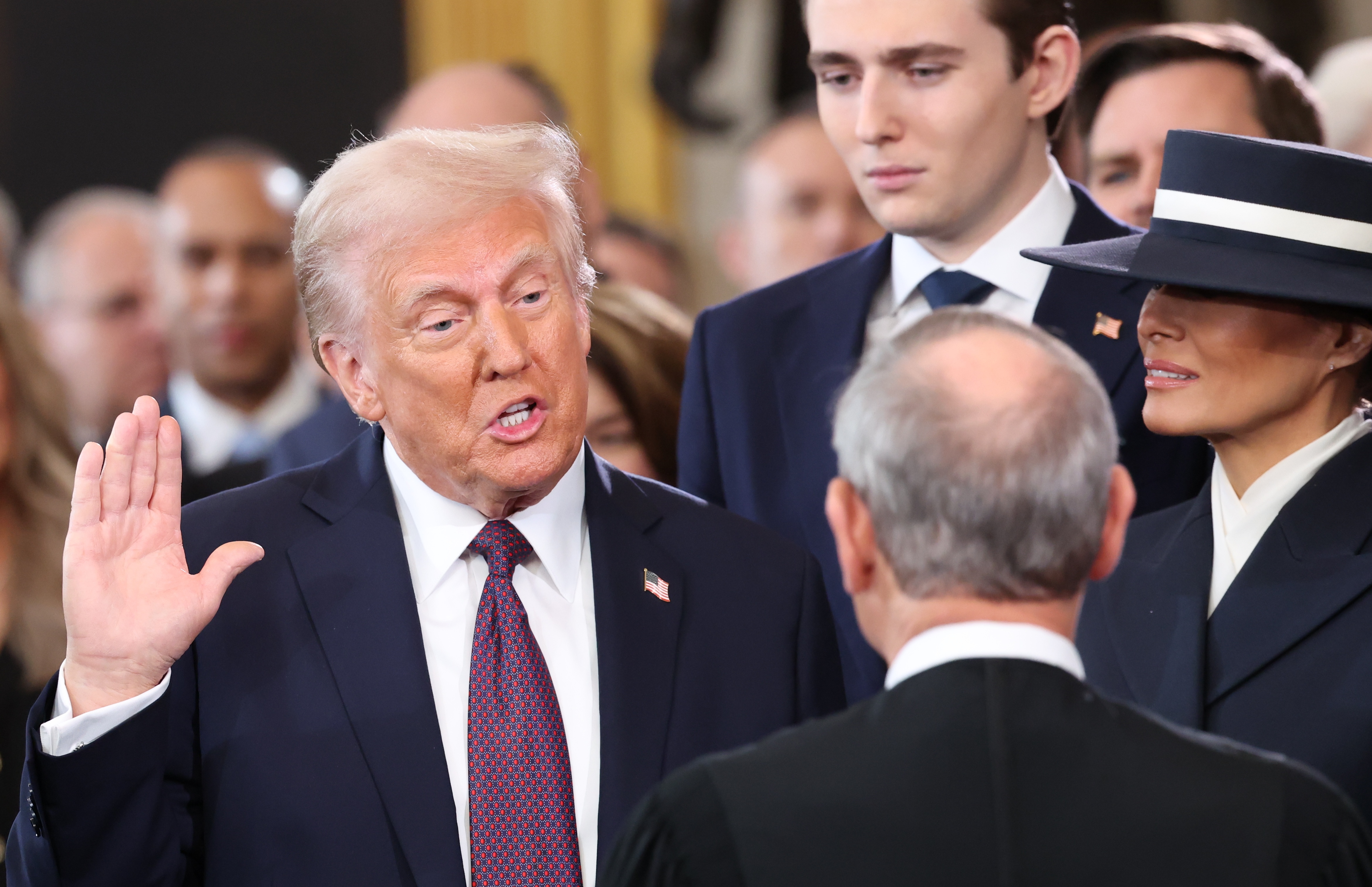 epa11839250 Donald Trump is sworn in as the 47th US President in the US Capitol Rotunda in Washington, DC, USA, 20 January 2025.  EPA-EFE/KEVIN LAMARQUE / POOL