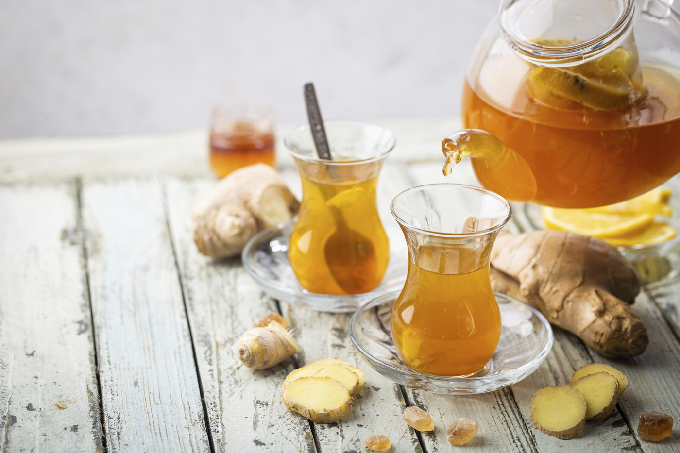 Ginger tea in a glass cup with lemon and mint on light background,Image: 1022351595, License: Royalty-free, Restrictions: , Model Release: no, Credit line: Tatiana Goskova / imageBROKER / Profimedia