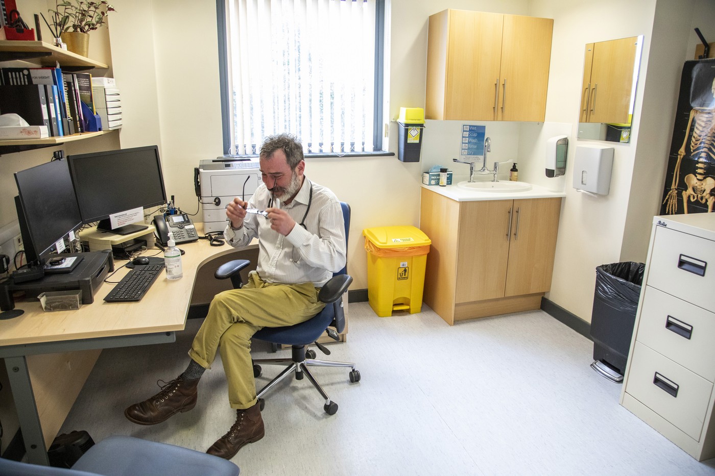 Doctor working at a desk in a medical office