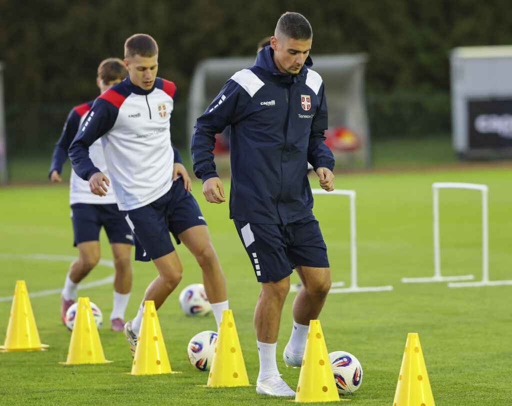 Andrej Ilic (R) and Ognjen Ugresic of Serbia during the Training Session of National Football team of Serbia at Sports center FSS on October 06, 2025 in Stara Pazova , Serbia. (Photo by Srdjan Stevanovic/Starsport.rs ©)
