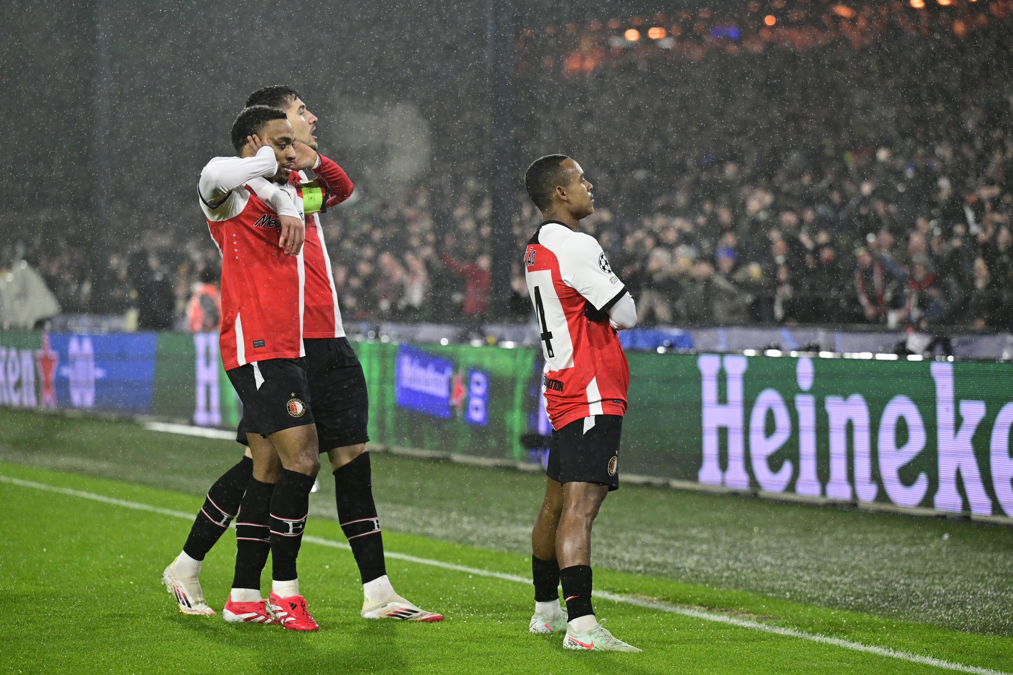 ROTTERDAM - (l-r) Quinten Timber of Feyenoord, Jakub Moder of Feyenoord, Igor Paixao of Feyenoord celebrate 1-0 during the UEFA Champions League playoff match between Feyenoord and AC Milan at Feyenoord Stadion de Kuip on Feb. 12, 2025 in Rotterdam, Nethe