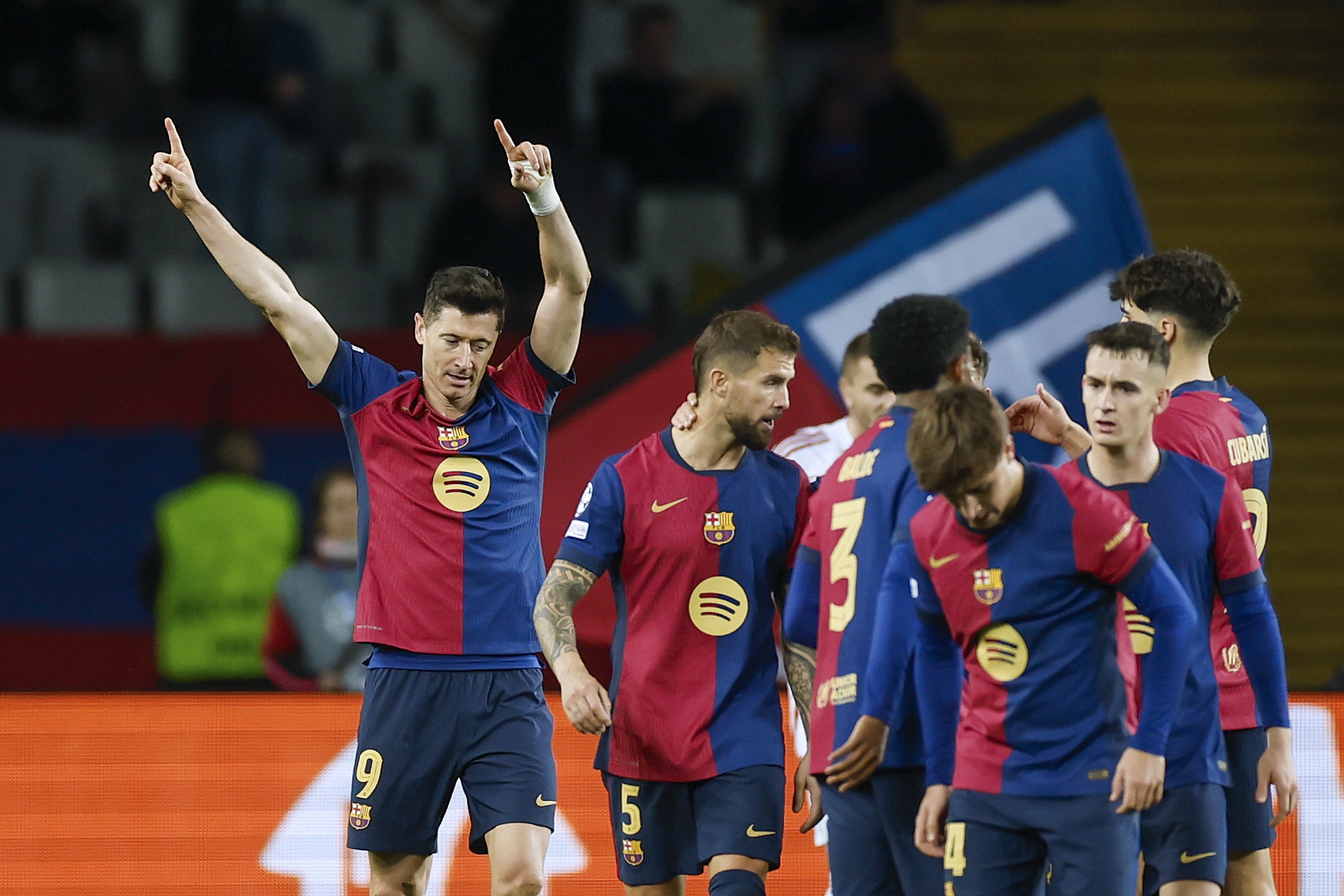 epa11742741 FC Barcelona's Robert Lewandowski celebrates after scoring the 3-0 goal during the UEFA Champions League soccer match between FC Barcelona and Stade Brestois (Brest) in Barcelona, Spain, 26 November 2024.  EPA-EFE/Alberto Estevez