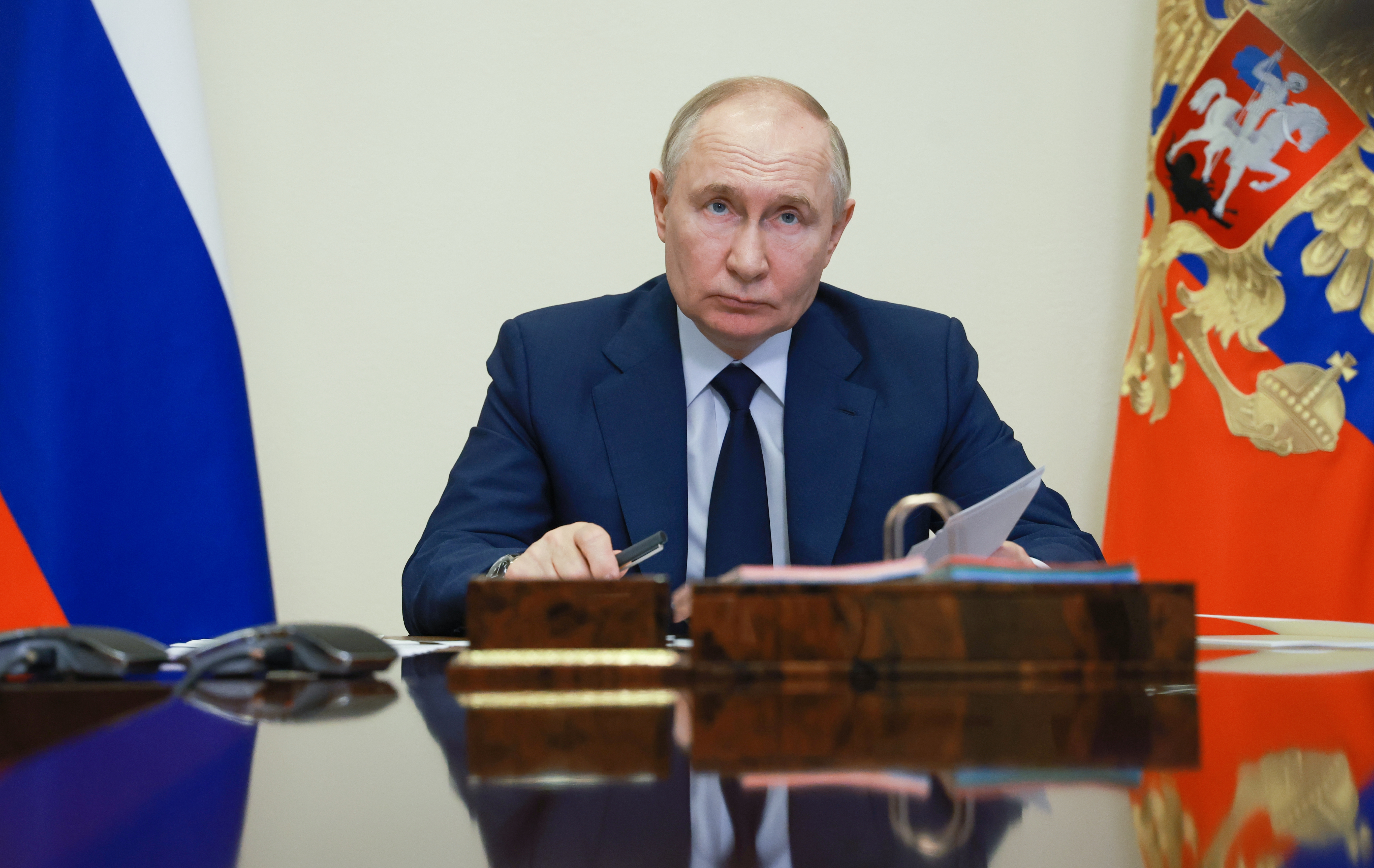 epa11480070 Russian President Vladimir Putin attends a ceremony of launch a new metallurgical facilities via video-link, at Novo-Ogaryovo state residence, outside Moscow, Russia, 15 July 2024.  EPA-EFE/VYACHESLAV PROKOFIEV/SPUTNIK/KREMLIN / POOL