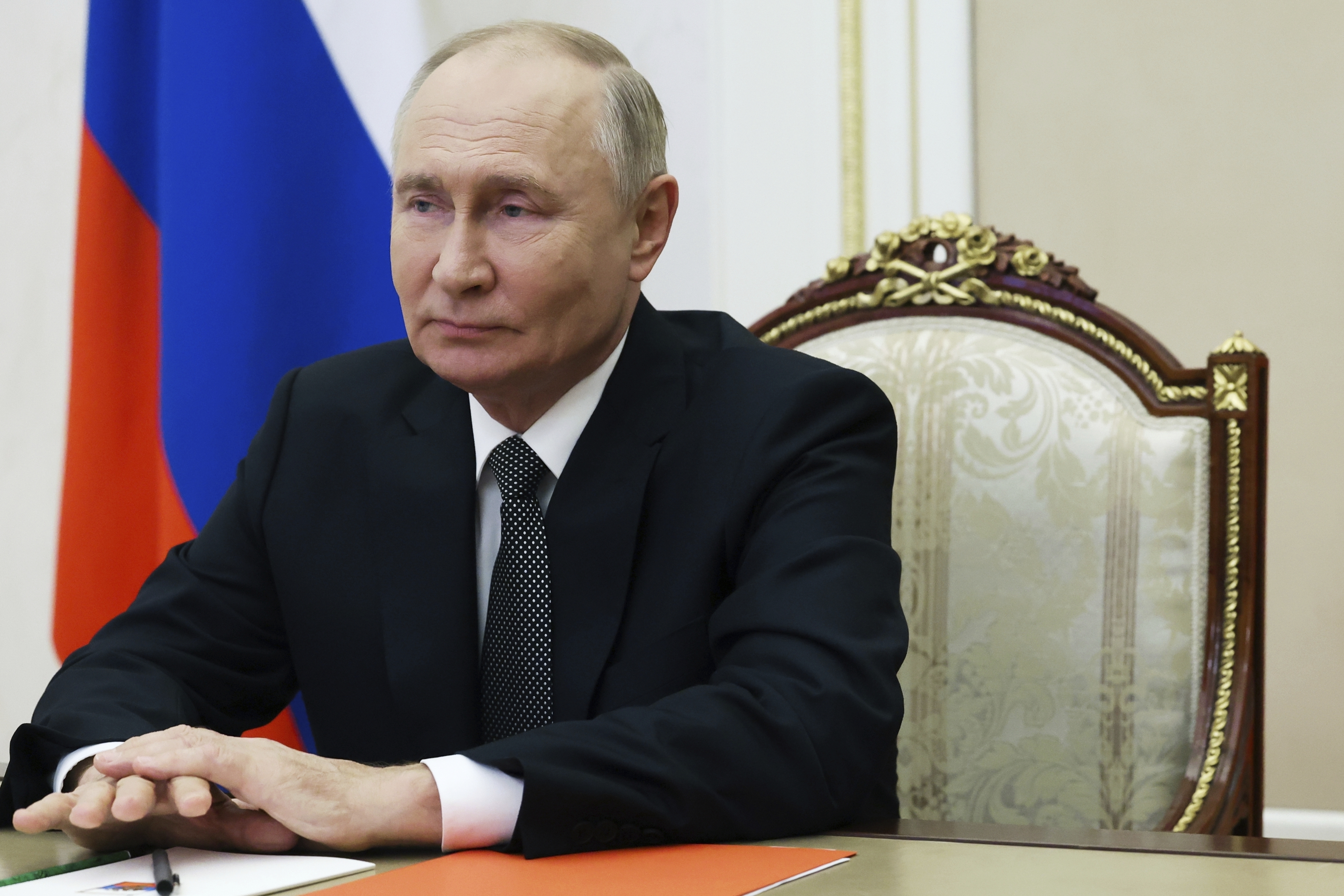 Russian President Vladimir Putin holds a Security Council meeting via videoconference in Moscow, Russia, Friday, Sept. 27, 2024. (Sergei Ilyin, Sputnik, Kremlin Pool Photo via AP)