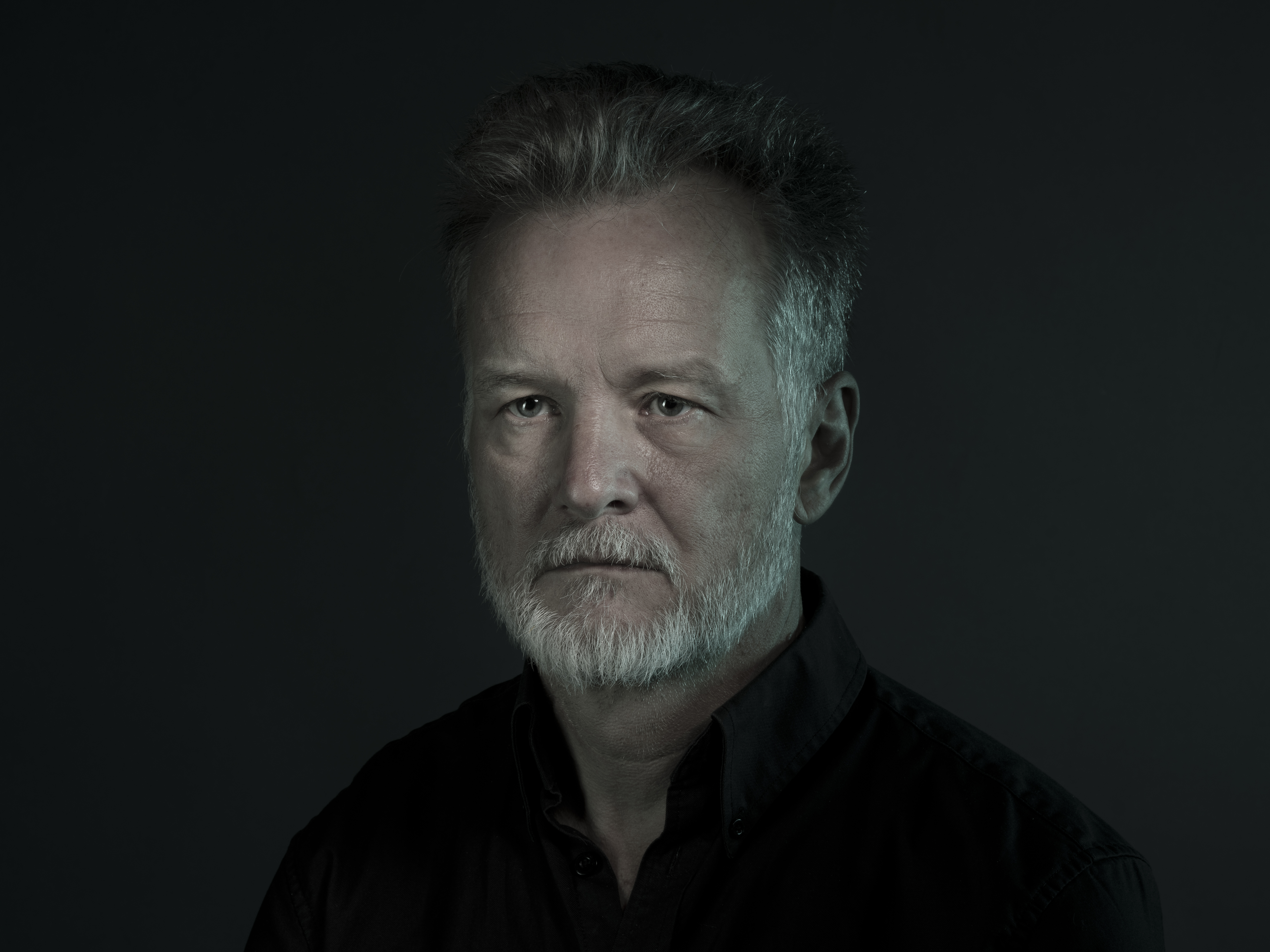 This photograph, provided by the VII Foundation, shows Paul Lowe posing for a portrait in Sarajevo, Bosnia-Herzegovina, May 7, 2019. (Justin McKie/VII Foundation via AP)