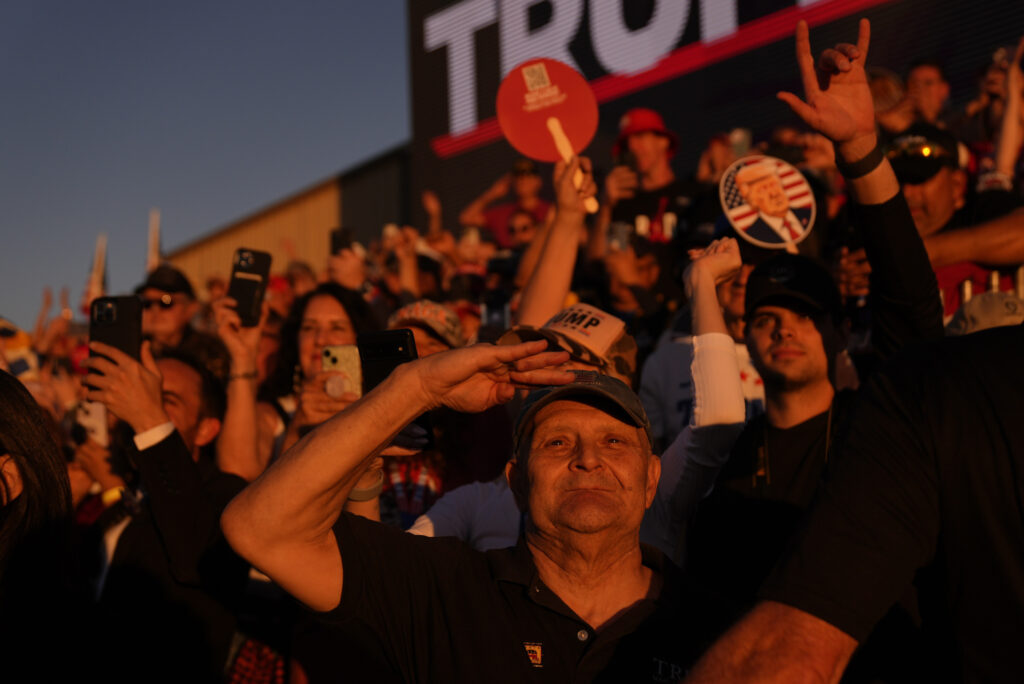 Supporters watch as Republican presidential nominee former President Donald Trump arrives for a campaign rally at Arnold Palmer Regional Airport, Saturday, Oct. 19, 2024, in Latrobe, Pa. (AP Photo/Evan Vucci)