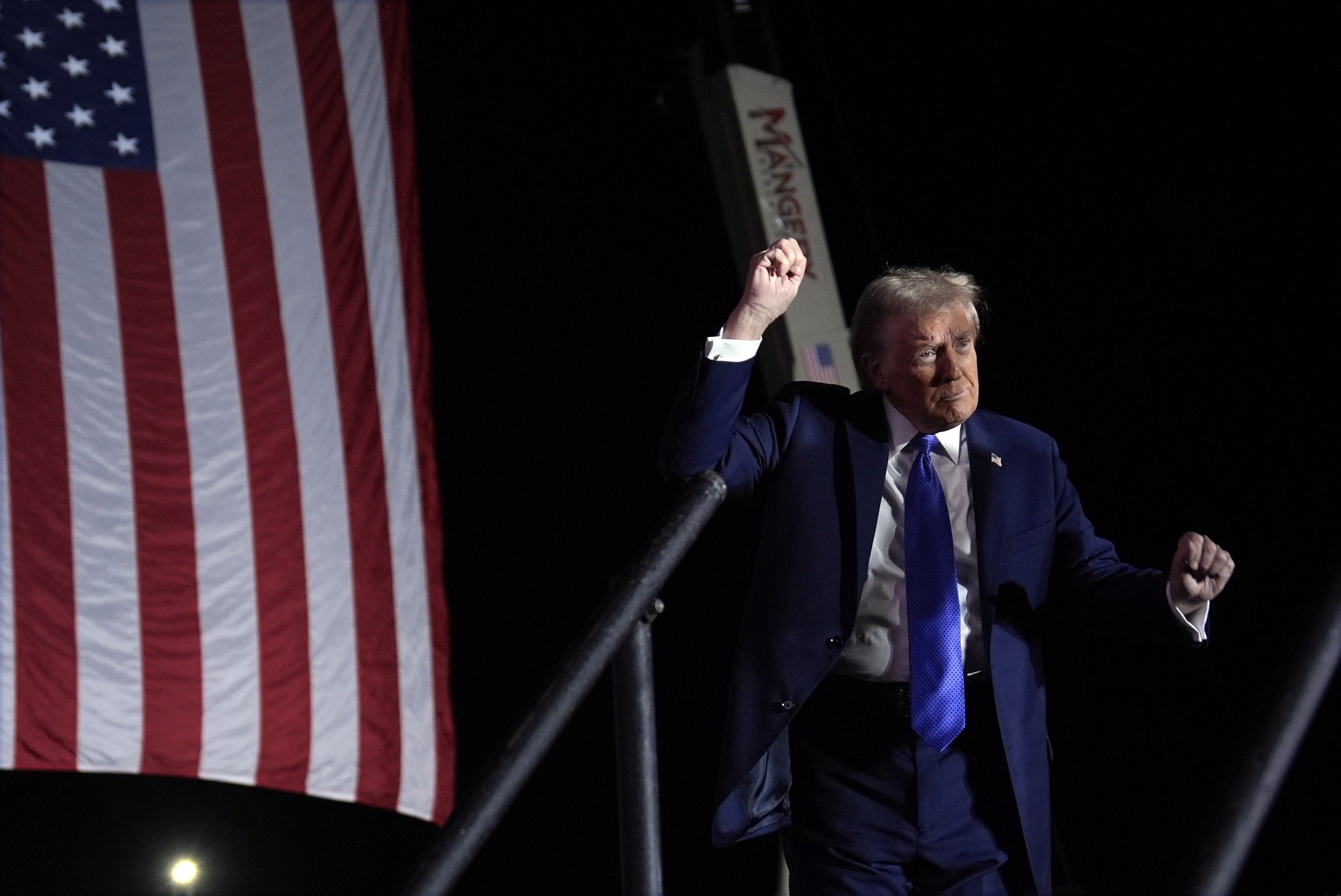 Republican presidential nominee former President Donald Trump dances at a campaign rally at Arnold Palmer Regional Airport, Saturday, Oct. 19, 2024, in Latrobe, Pa. (AP Photo/Evan Vucci)