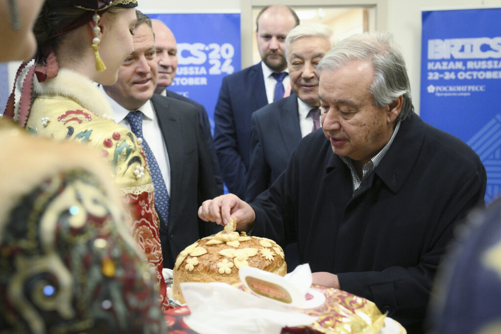 United Nations Secretary-General Antonio Guterres is welcomed upon his arrival at Kazan Airport for the BRICS summit in Kazan, Russia, Wednesday, Oct. 23, 2024. (Alexey Filippov/brics-russia2024.ru via AP)