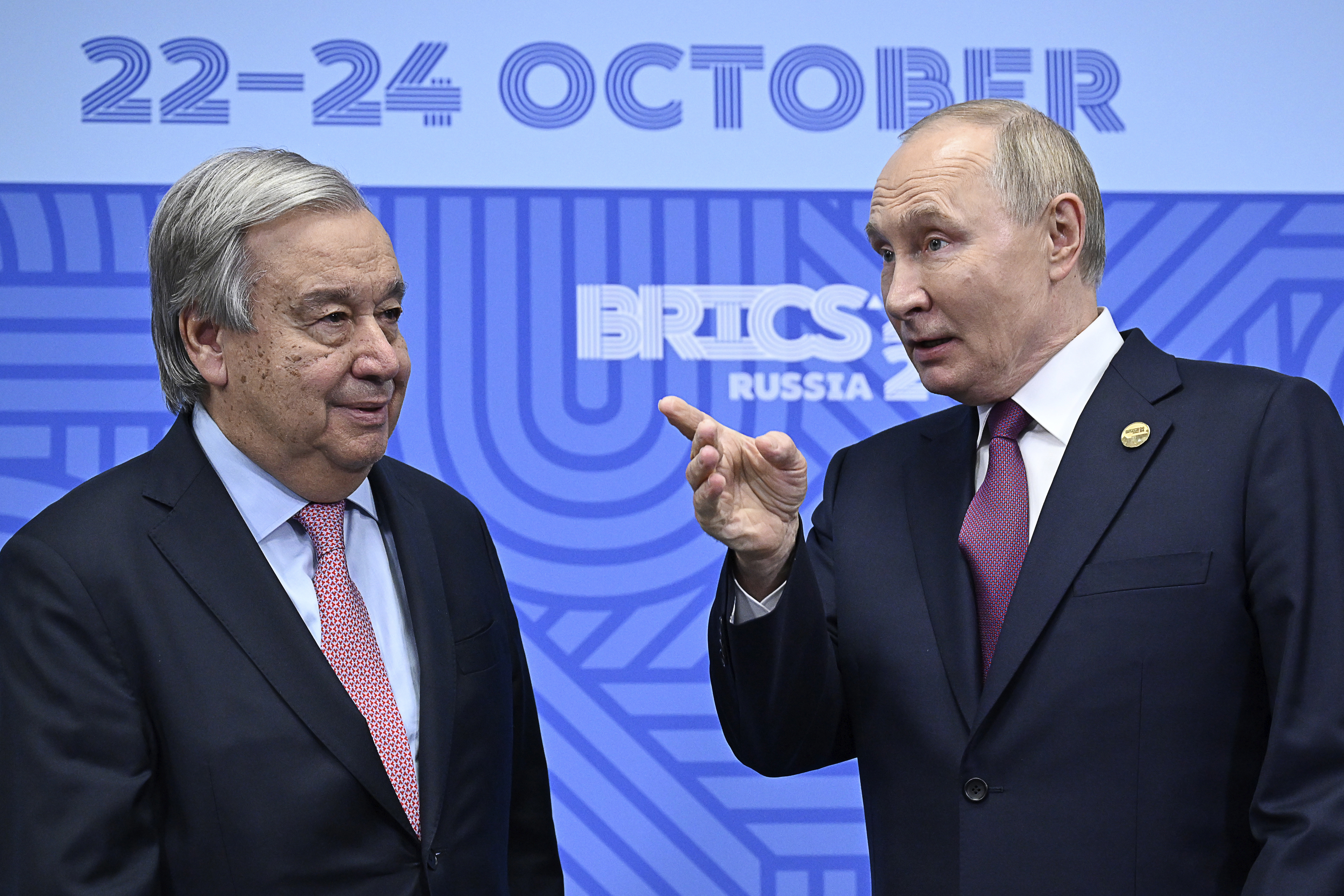 Russian President Vladimir Putin, right, greets United Nations (UN) Secretary General Antonio Guterres during their bilateral meeting on the sidelines of the BRICS summit in Kazan, Russia, Thursday, Oct. 24, 2024. (Alexander Nemenov, Pool Photo via AP)