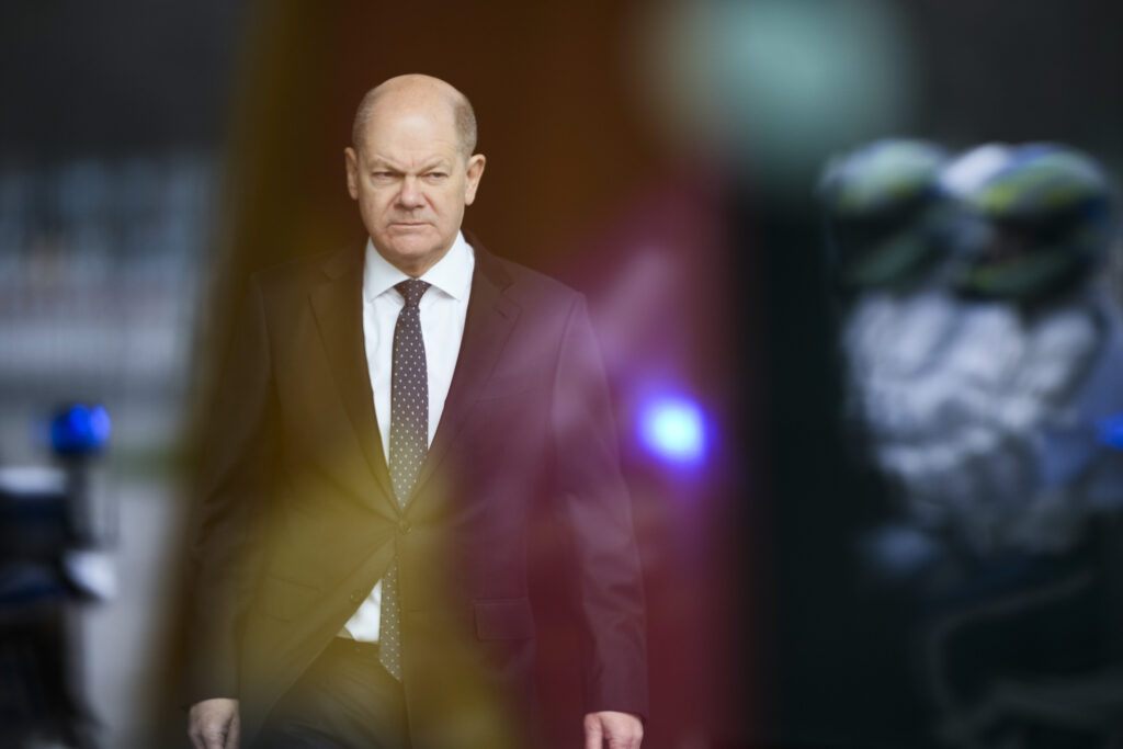 German Chancellor Olaf Scholz walks through the foyer of the chancellery to welcome European Council President Charles Michel for talks at the chancellery in Berlin, Friday, March 15, 2024. (AP Photo/Markus Schreiber)