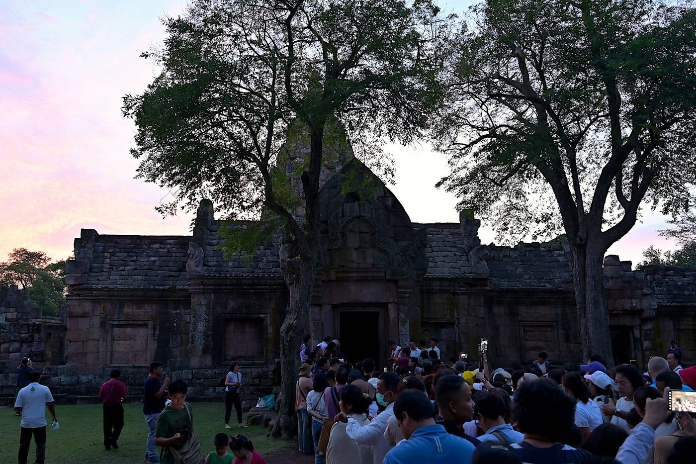 Visitors at Prasat Phanom Rung, waiting to catch a glimpse of the sunrise through the portals of the Hindu Khmer temple complex
