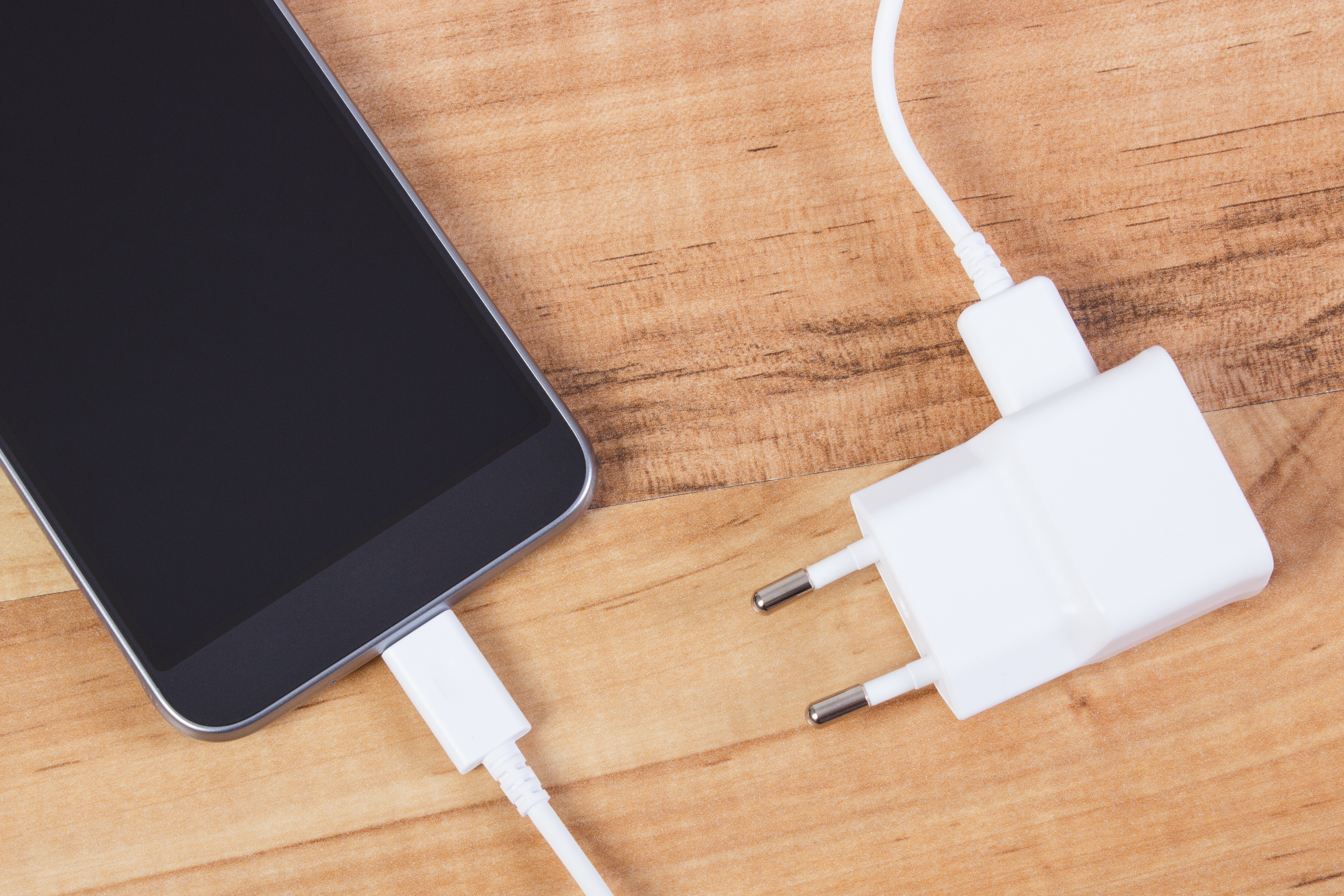 Mobile,Phone,With,Connected,Plug,Of,Charger,,Smartphone,Charging,On