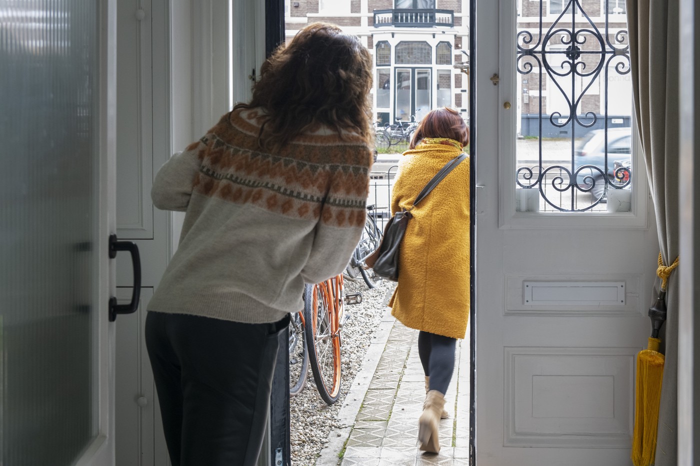 Saying goodbye to Mother in law, waving from the front door