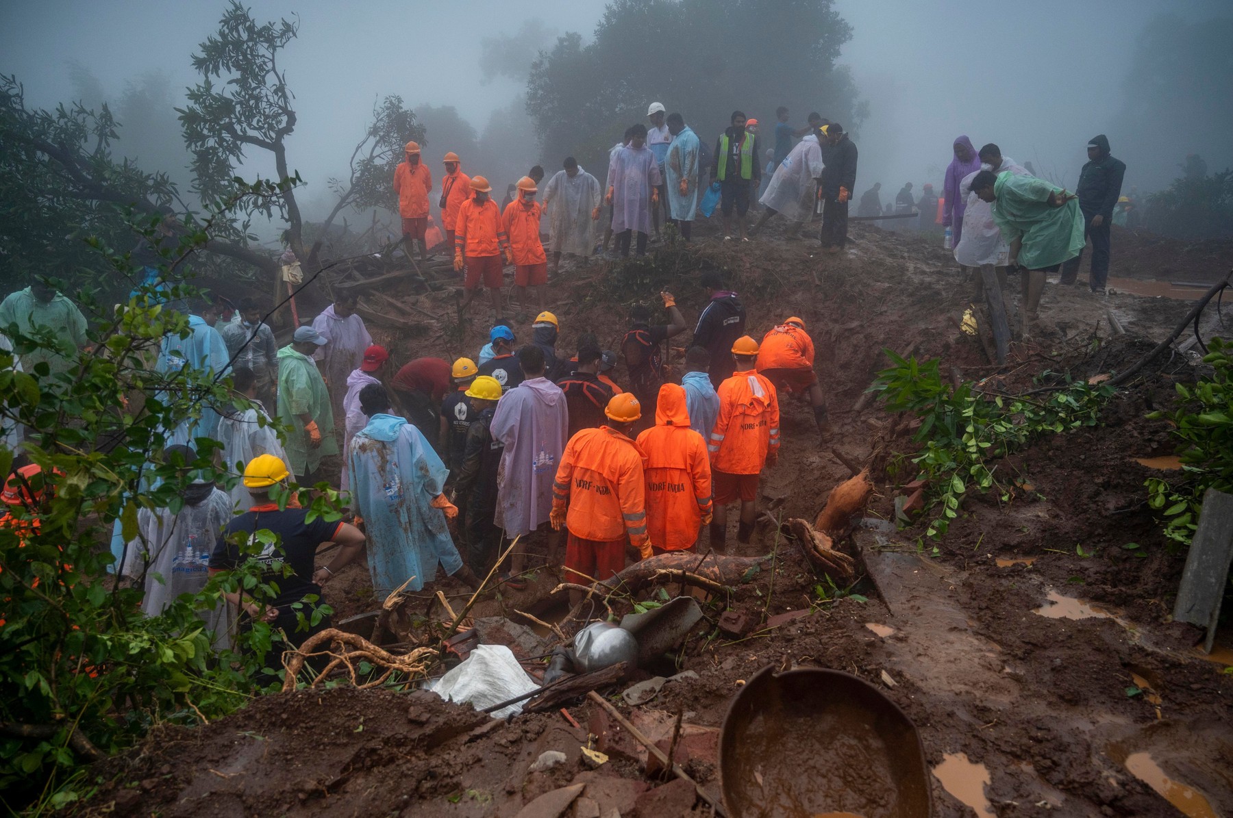 At Least 16 Dead, Over 100 Feared Trapped In Landslide In Raigad District Village, Mumbai, Maharashtra, India - 21 Jul 2023