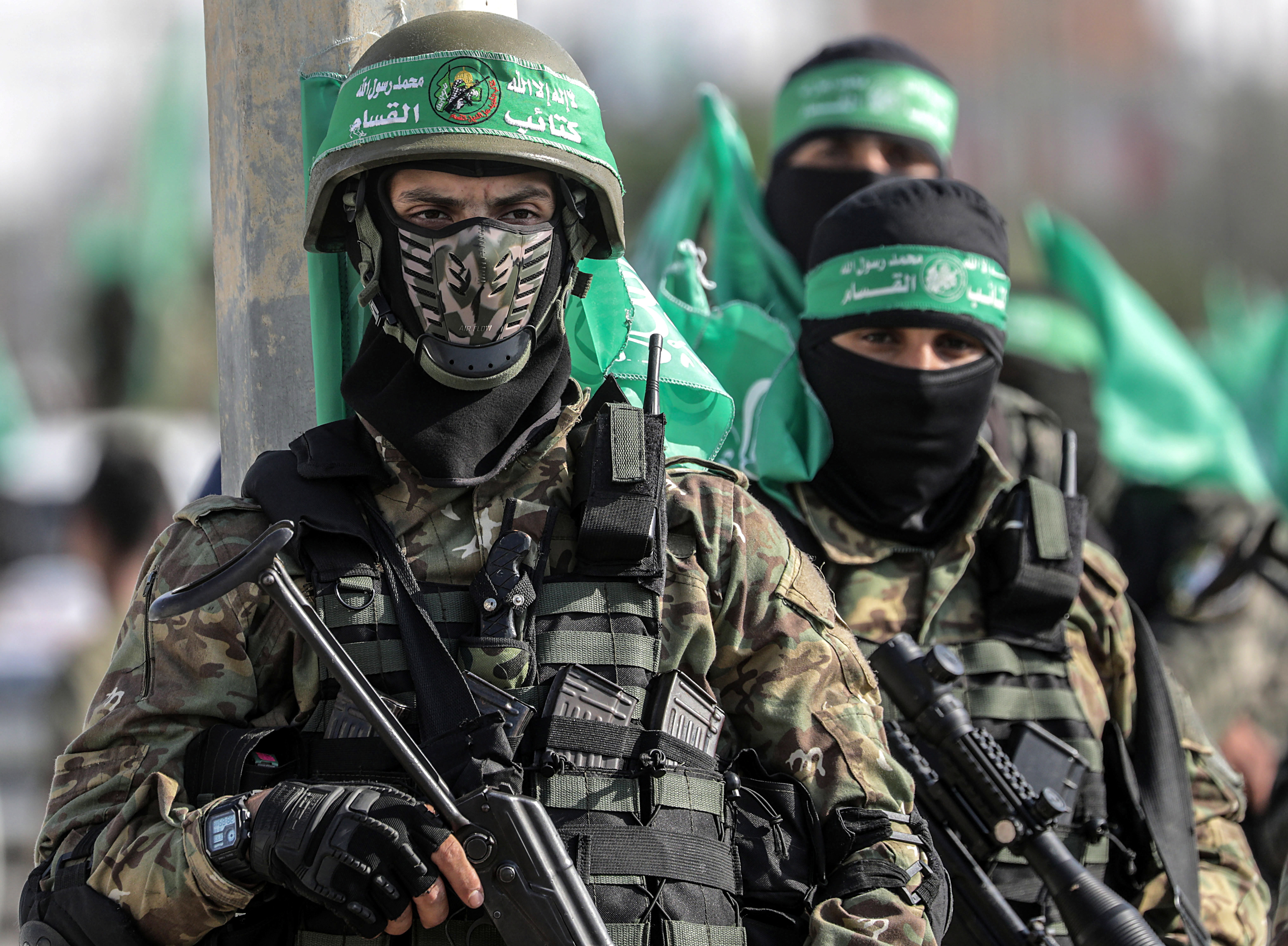 epa07988980 Fighters of Ezz al-Din al-Qassam brigades, the military wing of Hamas movement march during a military parade in the east Khan Younis town, southern Gaza Strip, 11 November 2019.  EPA-EFE/MOHAMMED SABER