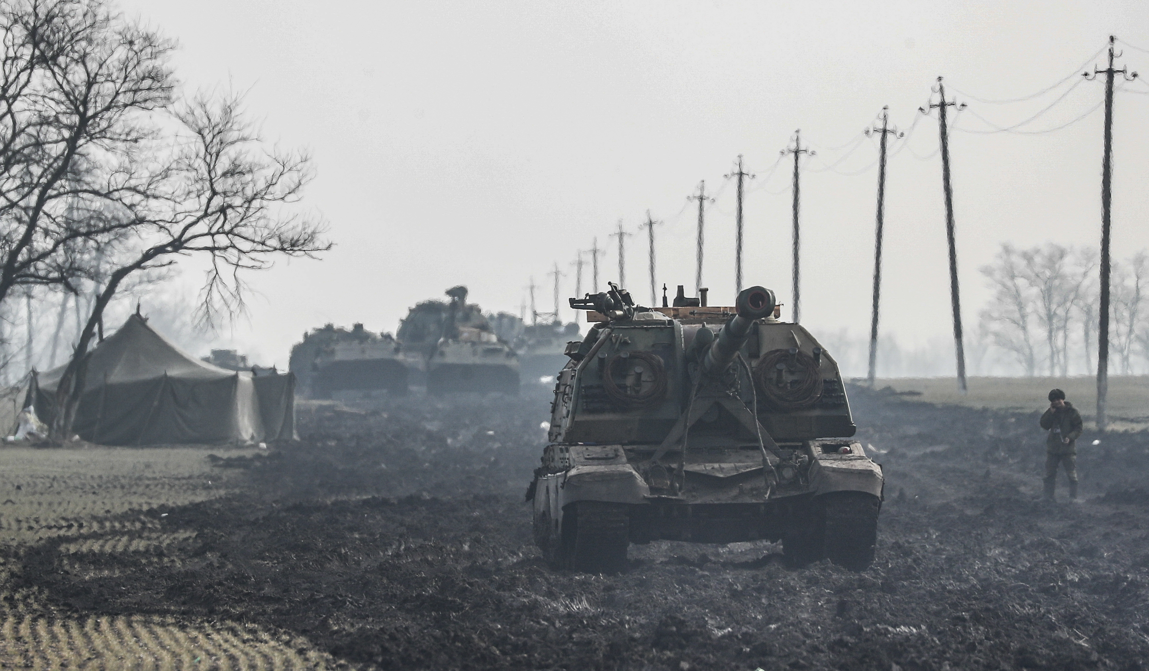 Russian armoured vehicles stand on the road in Rostov region