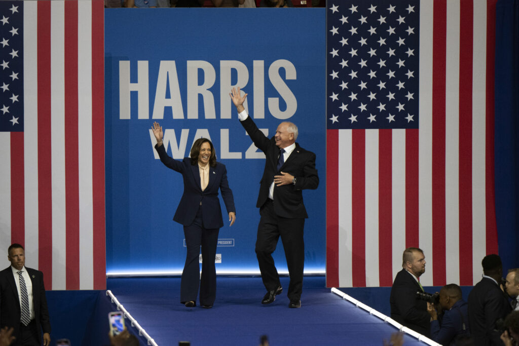 Democratic presidential nominee Vice President Kamala Harris and her running mate Minnesota Gov. Tim Walz arrive at a campaign rally in Philadelphia, Tuesday, Aug. 6, 2024. (AP Photo/Joe Lamberti)