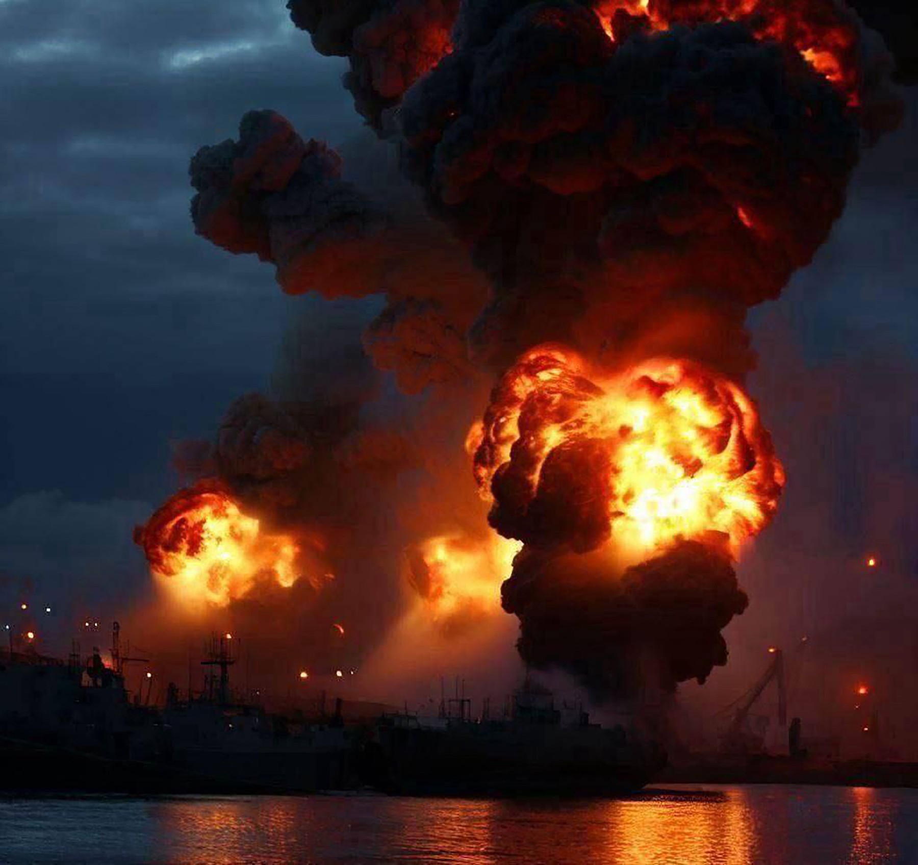 A huge explosion and fire at a Russian oil facility at Port Kavkaz in the Kerch Strait.