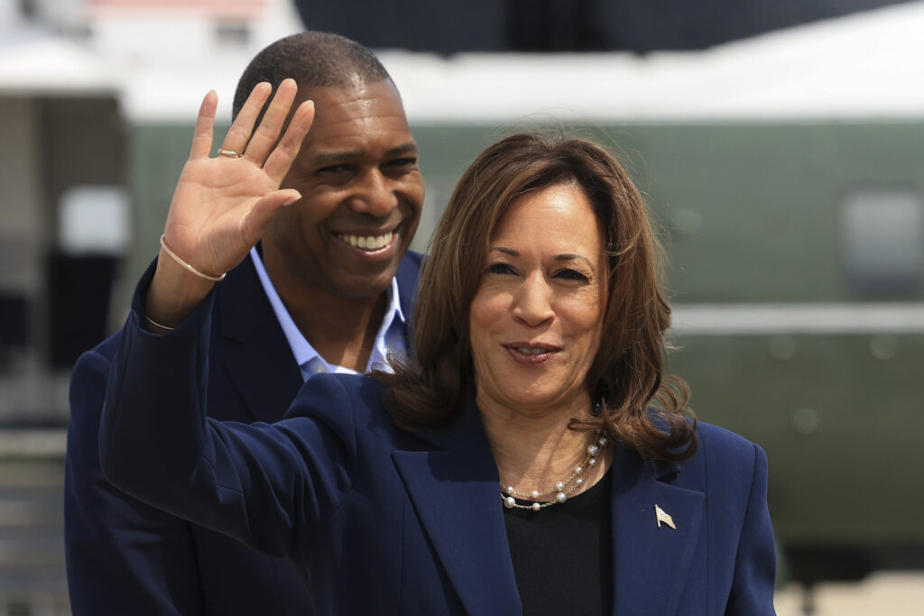 Vice President Kamala Harris waves before boarding Air Force Two as she departs on campaign travel to Milwaukee, Wisc., Tuesday, July 23, 2024 at Andrews Air Force Base, Md.  (Kevin Mohatt/Pool via AP)