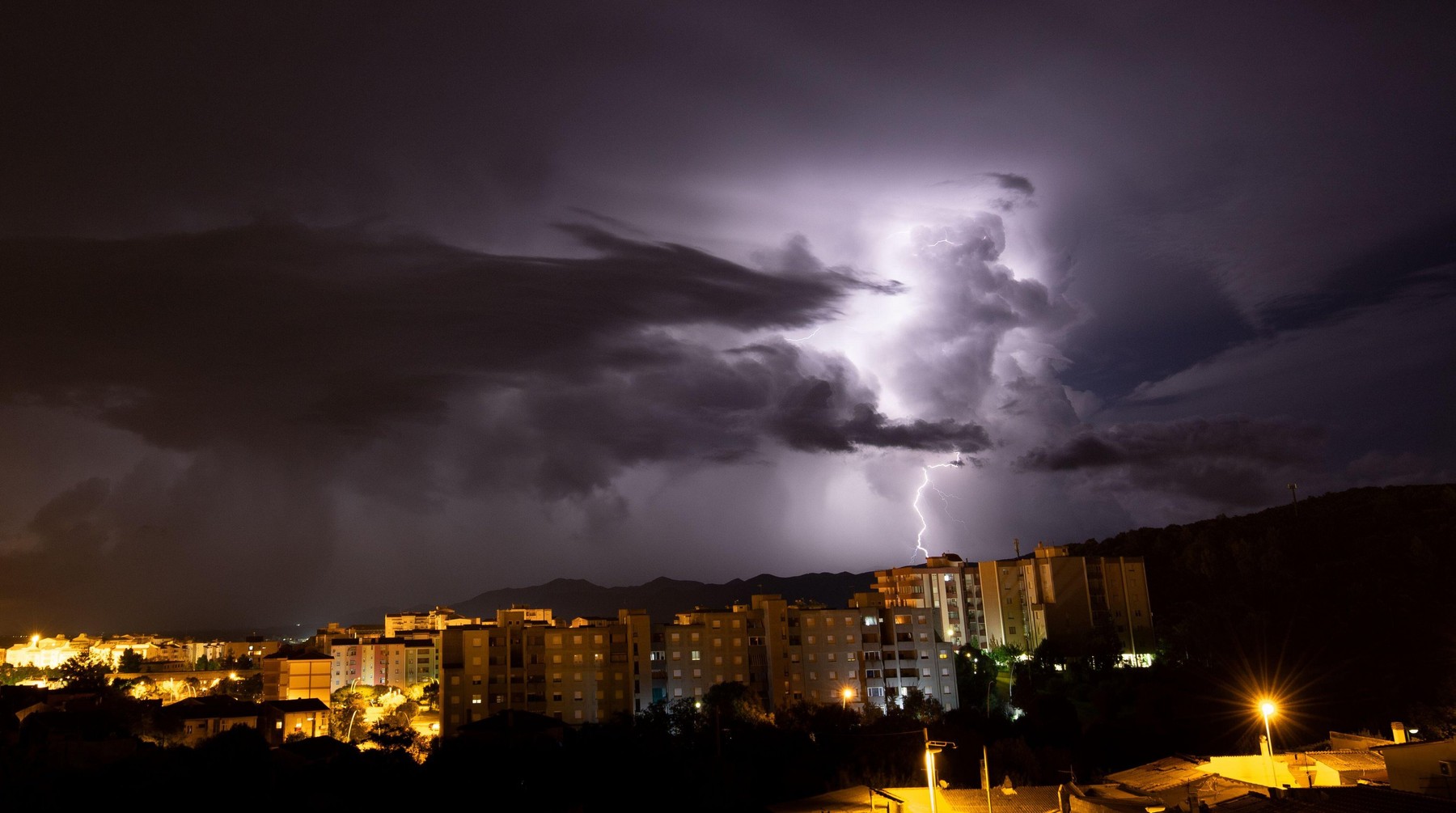 lightning during a storm over the city of iglesias, south sardinia