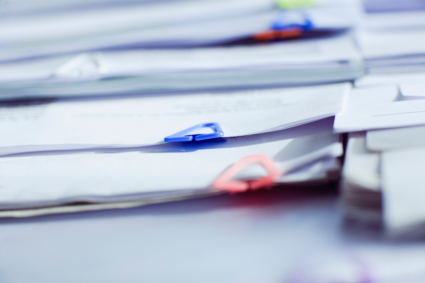 Paper clips on documents in office