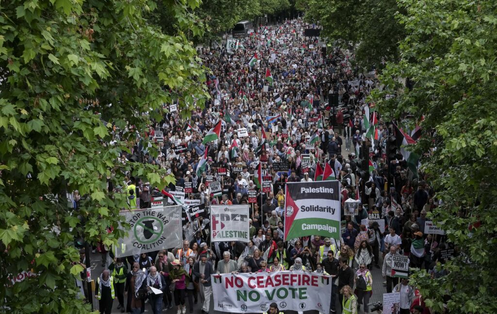 People take part in a national demonstration for Gaza from Russell Square to Whitehall in London, Saturday June 8, 2024. (Jeff Moore/PA via AP)